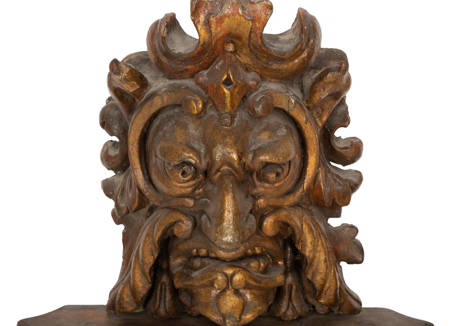 A Pair of Venetian Carved Wood Mask Wall Appliqués