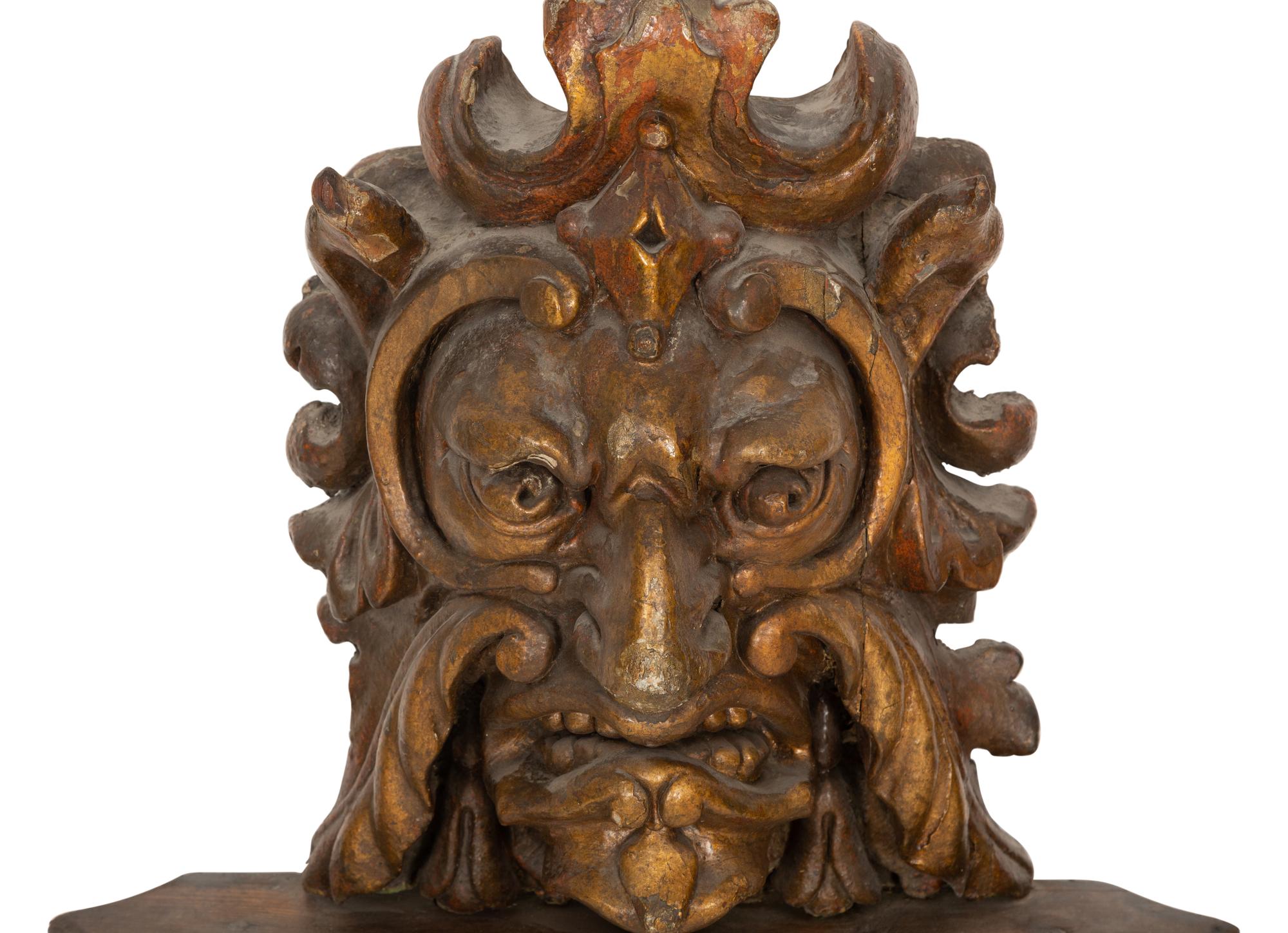 A Pair of Venetian Carved Wood Mask Wall Appliqués