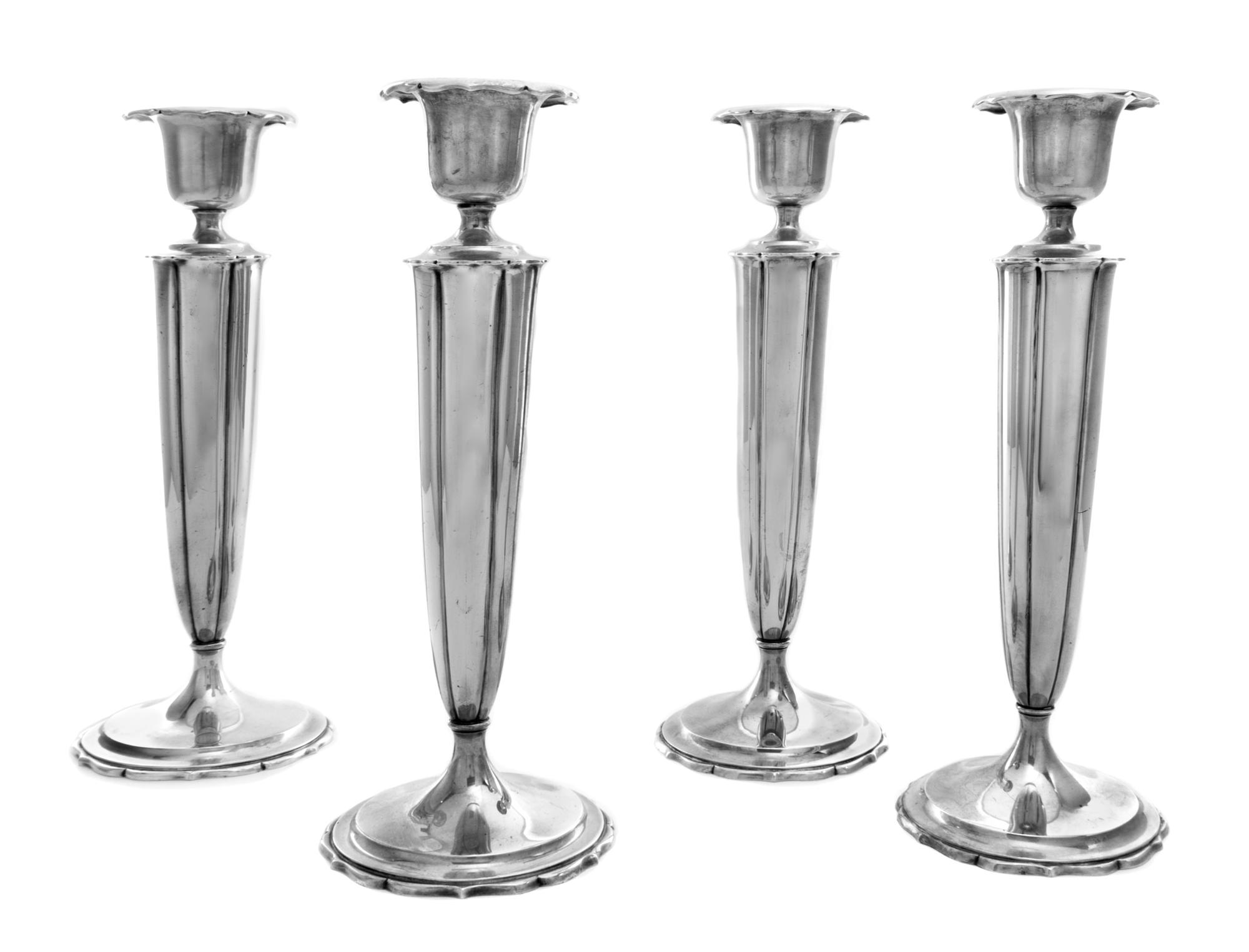 An Assembled Set of Four American Silver Candlesticks, Richard Dimes Co., South Boston, MA, engraved Etta and Clarence 1909-1934 on the