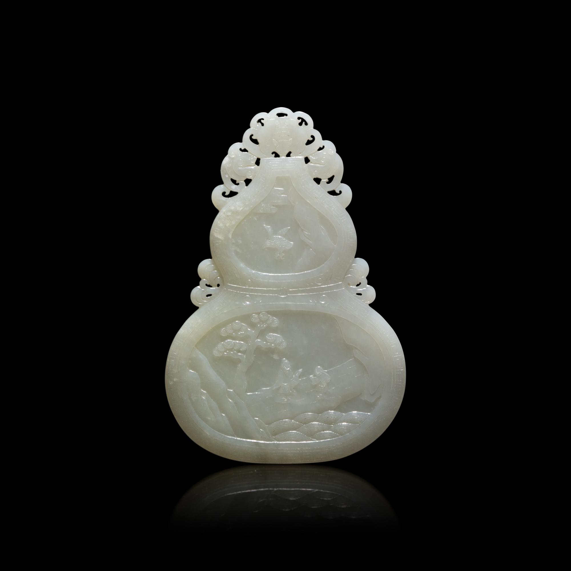 A Chinese White Jade Double Gourd Form Plaque 白玉雙面童子圖葫蘆牌