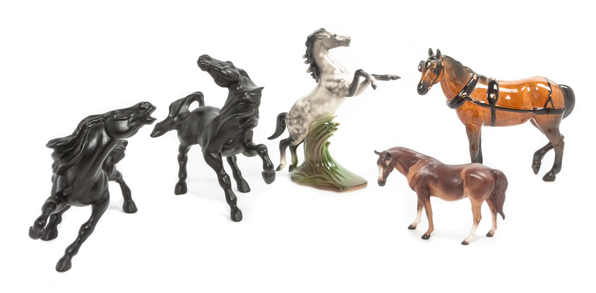 Five Ceramic Figures Height of tallest 9 1/2 inches.