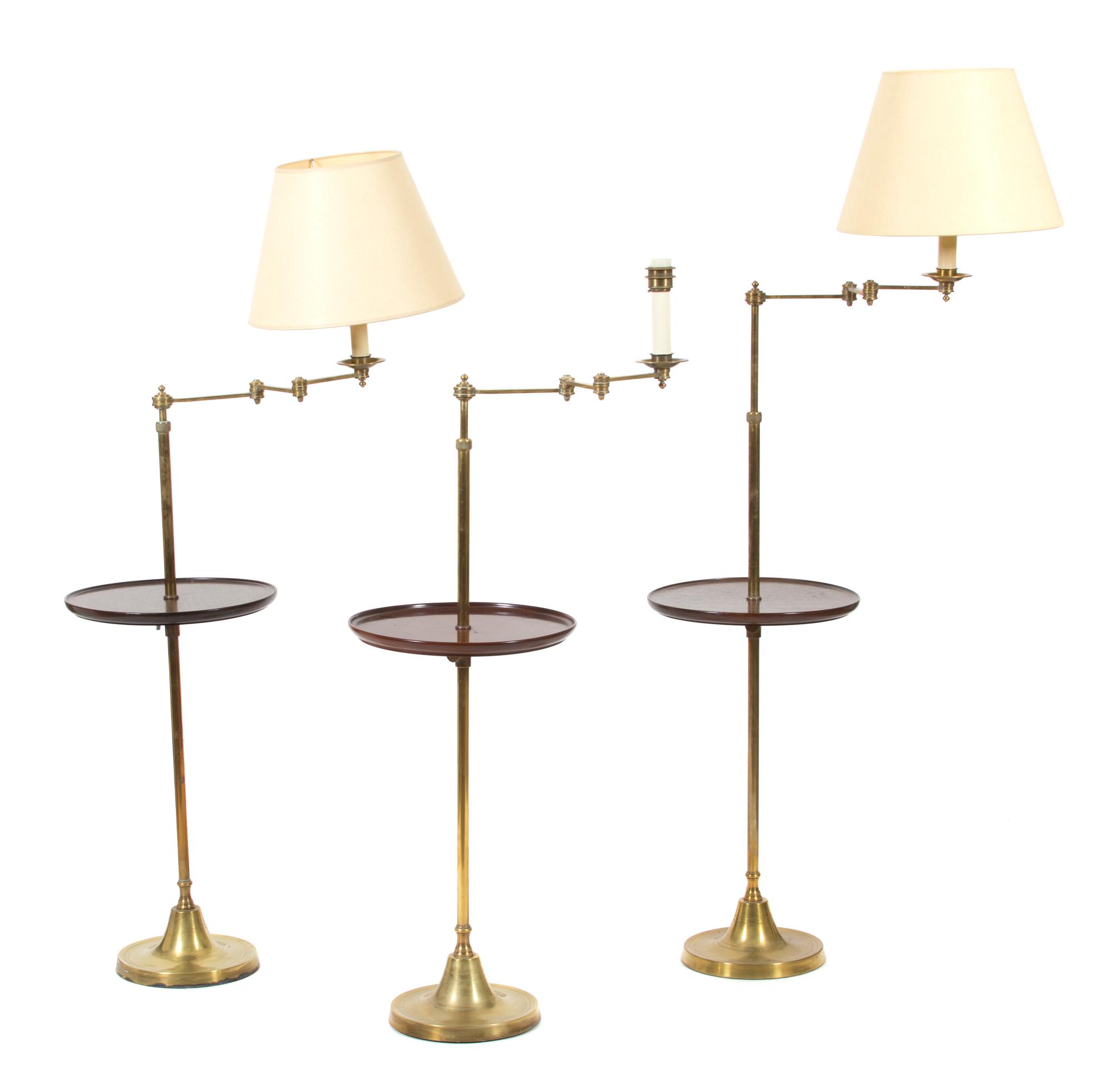 A Collection of Three Vaughan Brass Floor Lamps Height of tallest (to top of candlestick) 50 inches. — 20TH CENTURY