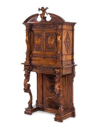 A Renaissance Revival Carved Walnut Cabinet on Stand