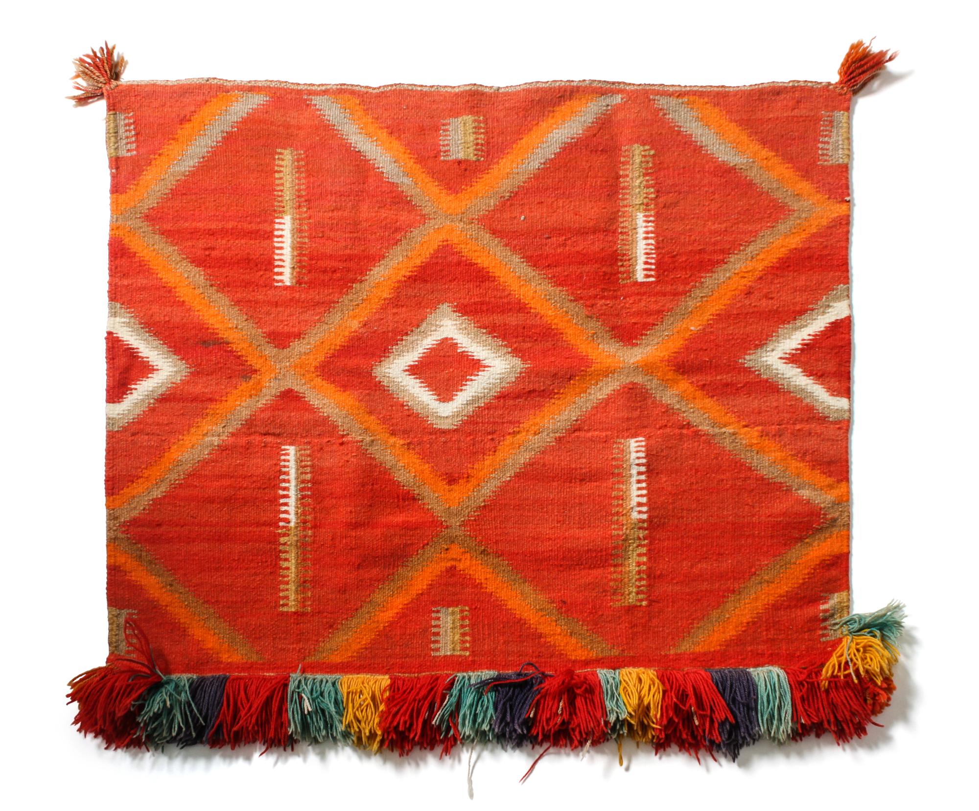 A Navajo Transitional Sunday Saddle Blanket 26 x 30 1/2 inches.
