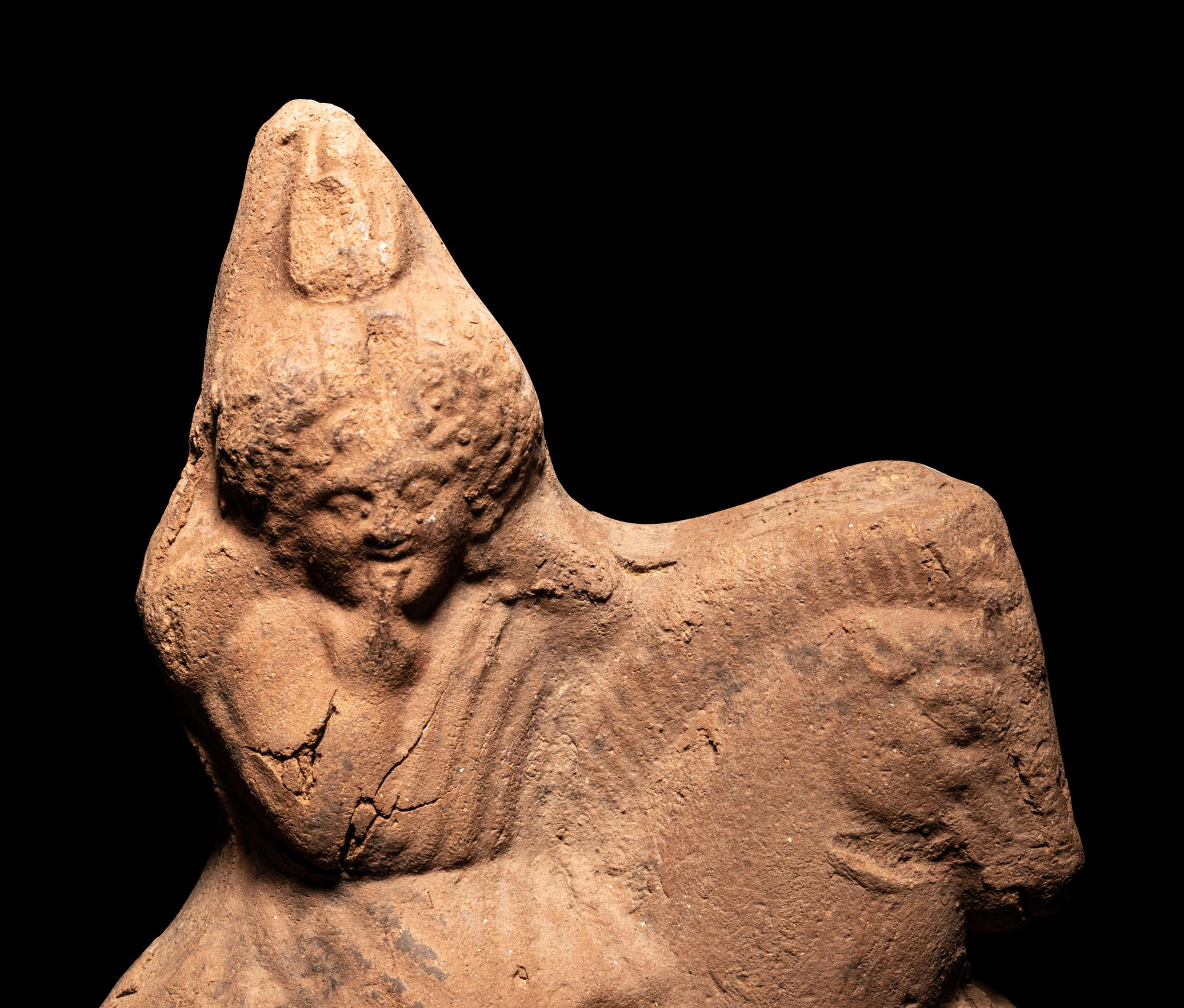 A Greek Terracotta with Harpocrates Riding a Horse