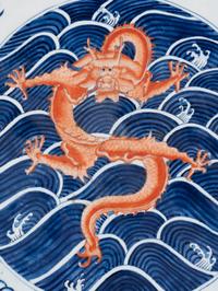 A Large Chinese Iron Red Decorated Blue and White Porcelain 'Dragon' Charger