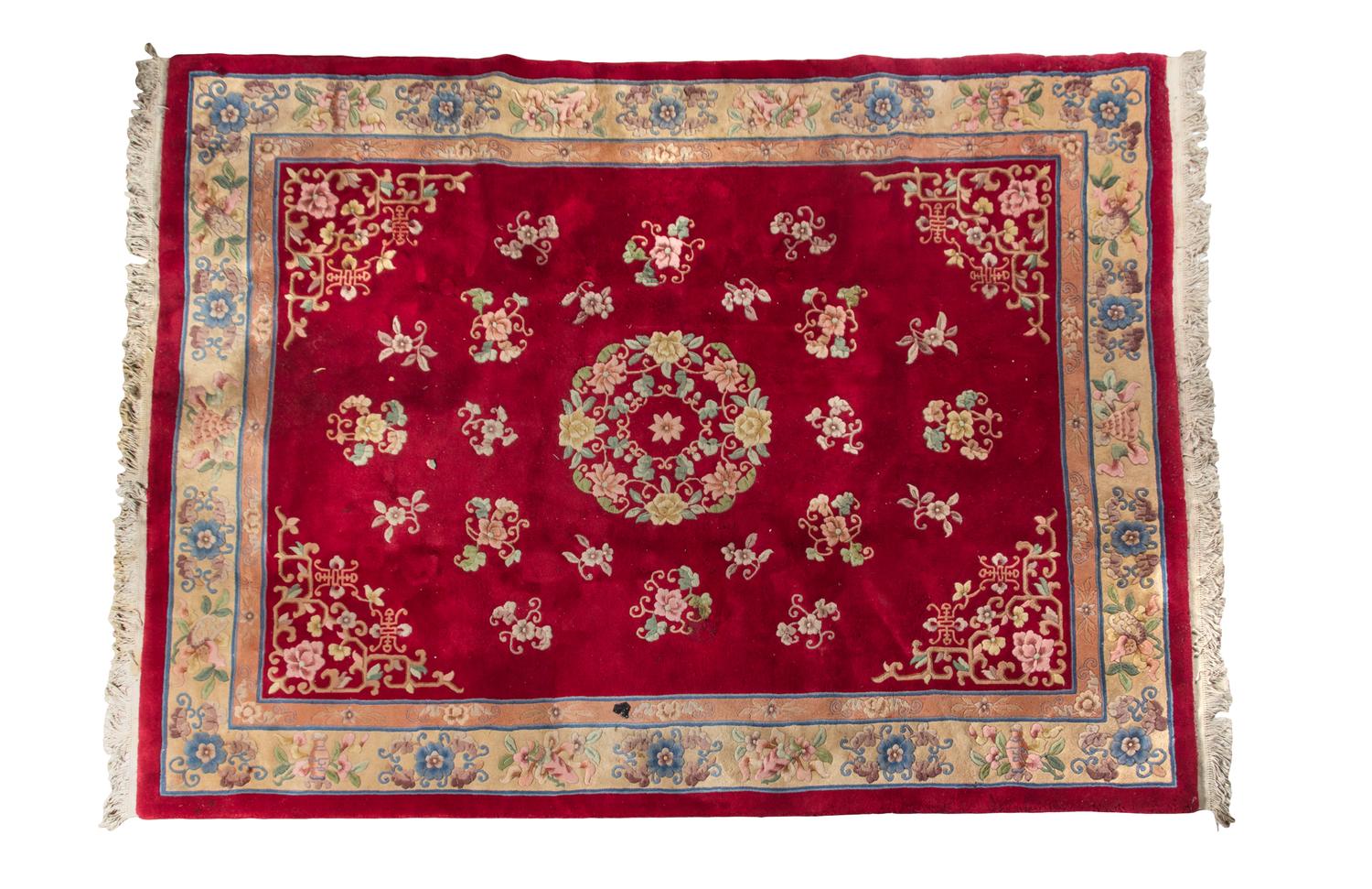 A Chinese Wool Rug 10 feet 2 inches x 7 feet 2 inches.