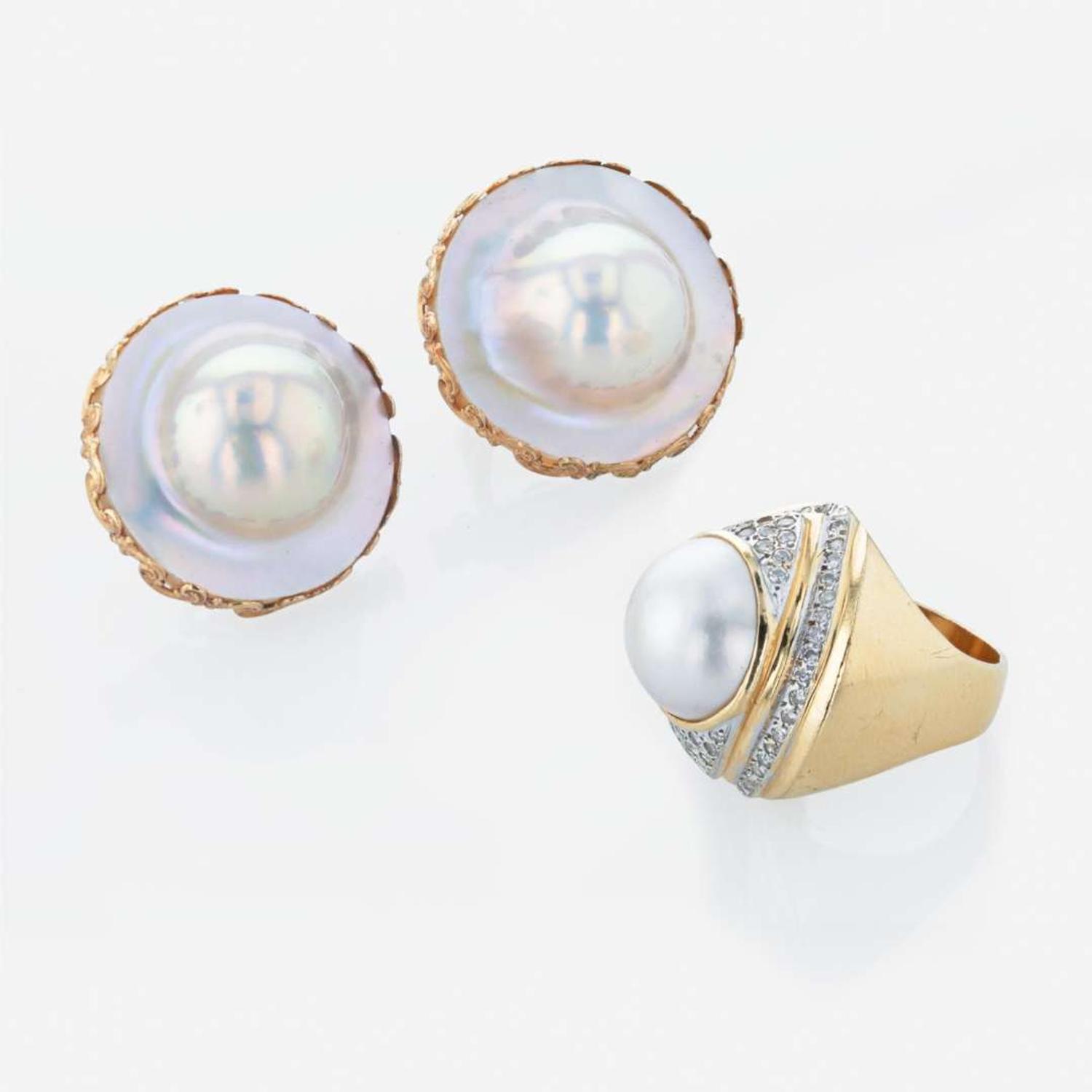 A 14K yellow gold pair of earrings and pearl and diamond ring