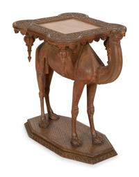 A Middle Eastern Carved Oak Camel-Form Side Table