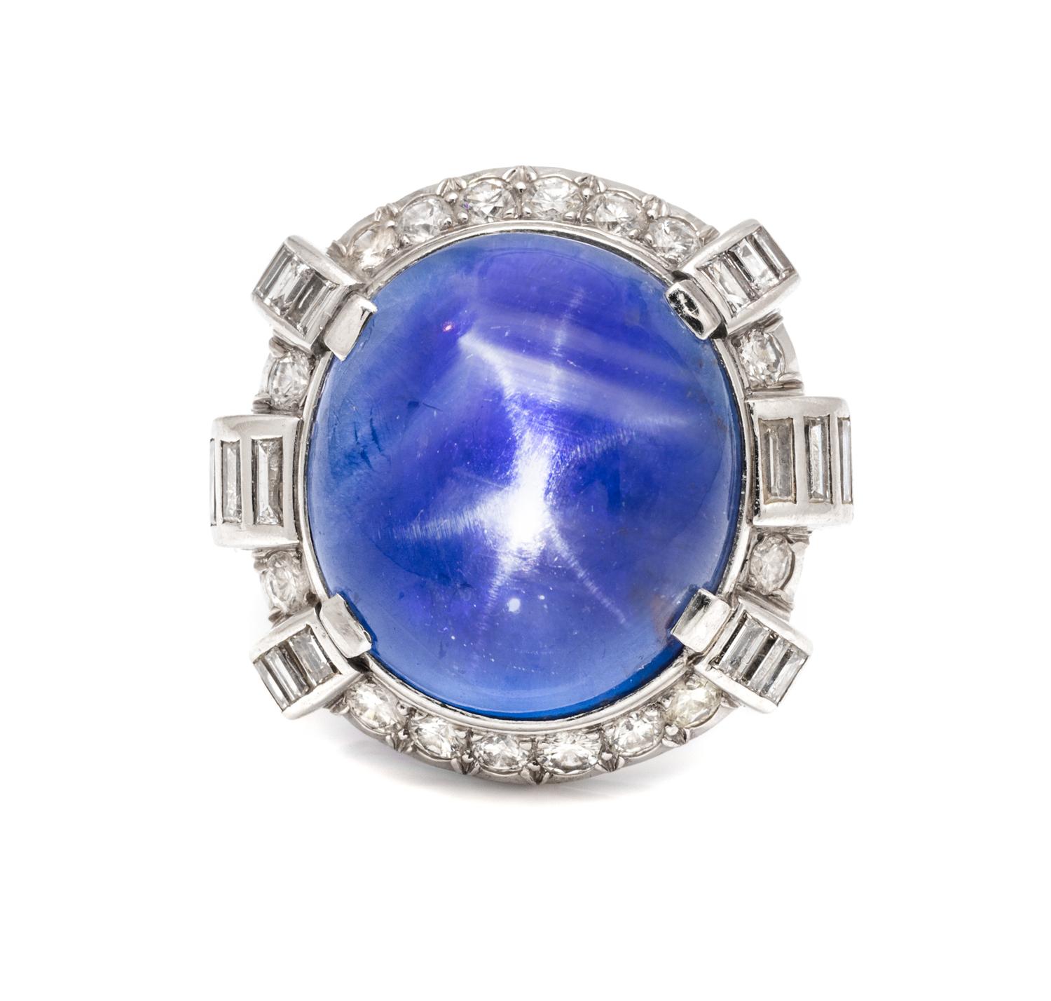 A Platinum, Star Sapphire and Diamond Ring, 11.10 dwts.