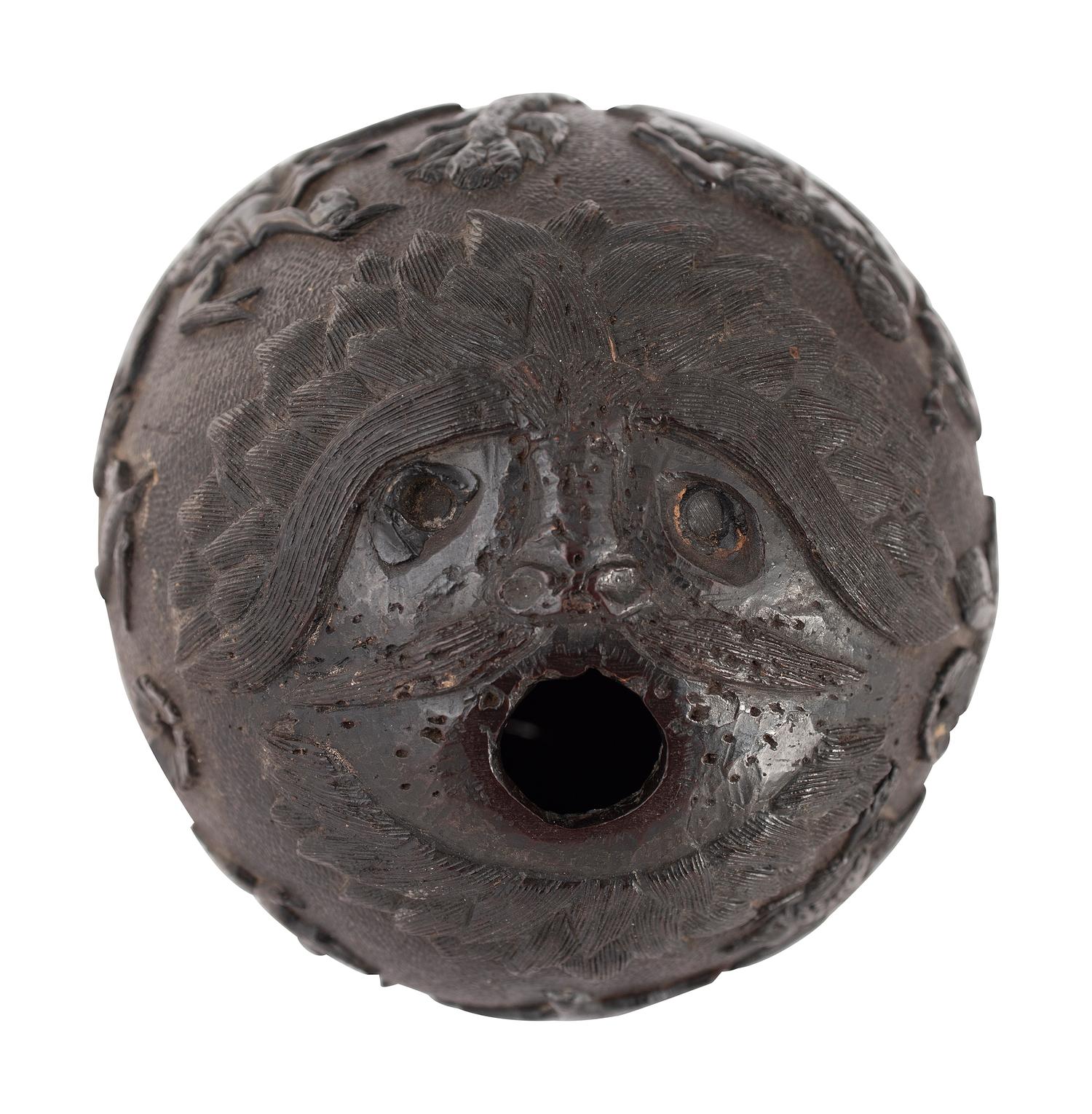 A Carved Coconut Depicting a Grisly American Indian Scene
