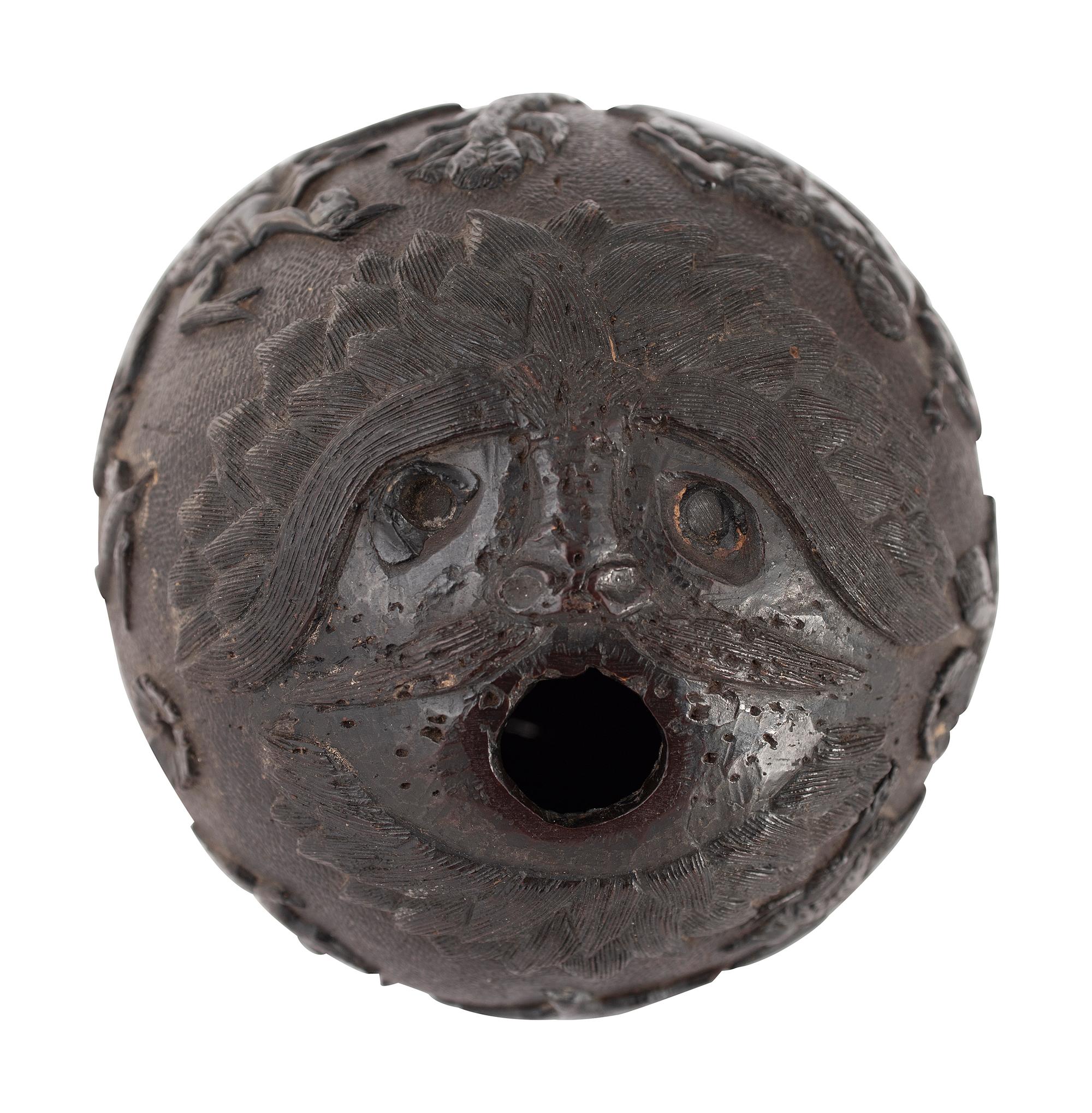 A Carved Coconut Depicting a Grisly American Indian Scene
