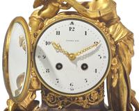 A Louis XVI Style Gilt-Bronze Mounted Rouge Marble Mantel Clock