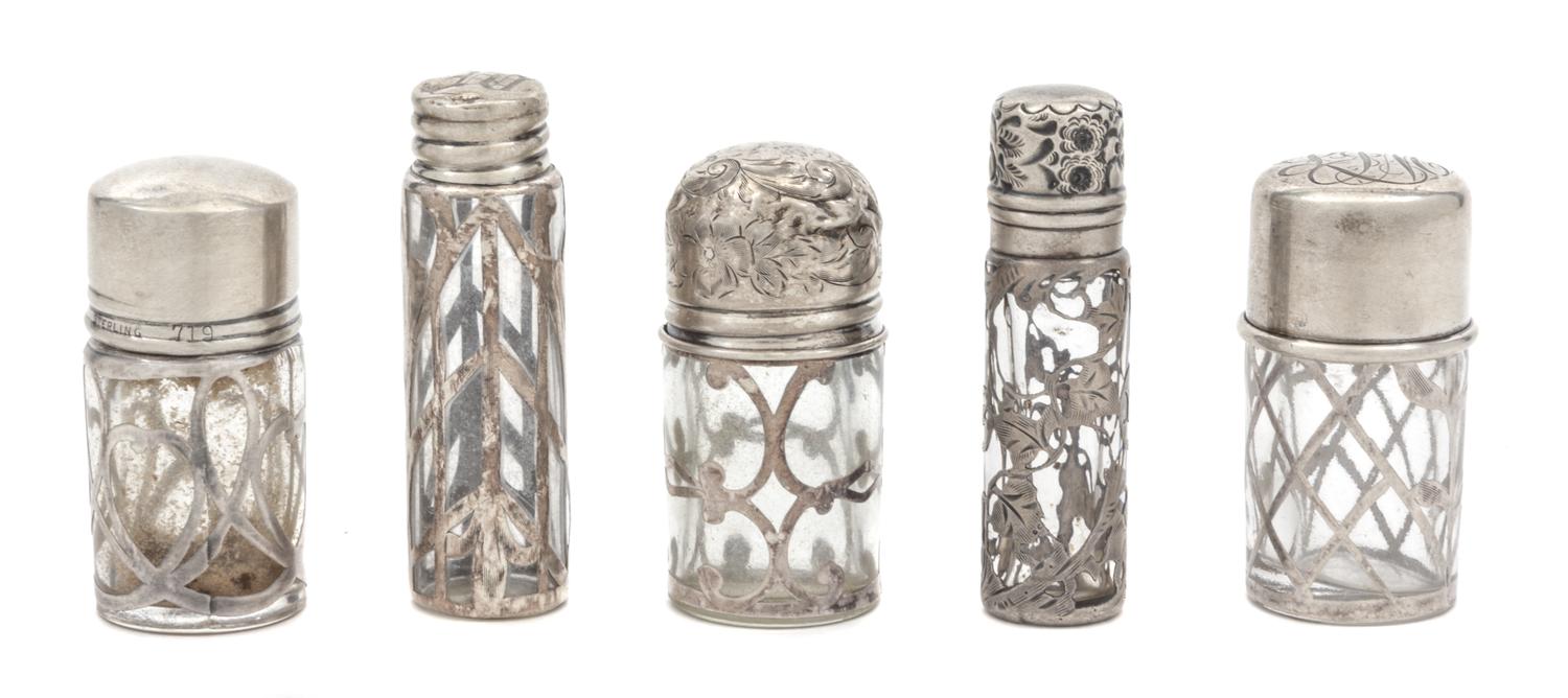 A Group Five Silver Overlay Glass Scent Bottles Height of tallest 2 5/8 inches.