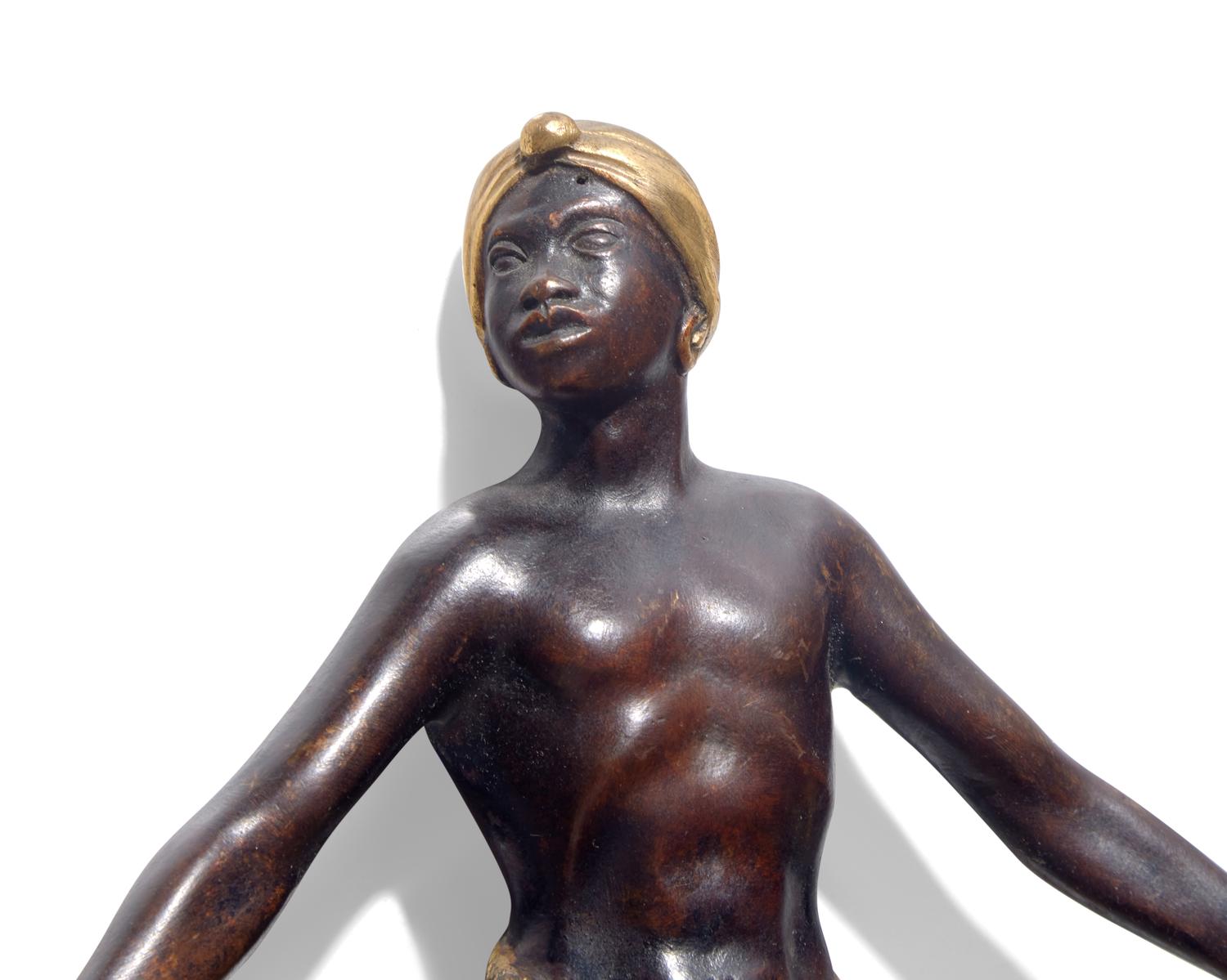 A pair of Louis XVI gilt and patinated bronze figural wall sconces, 18th / 19th century