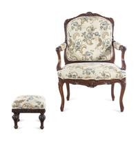 A Louis XV Style Carved Walnut Fauteuil