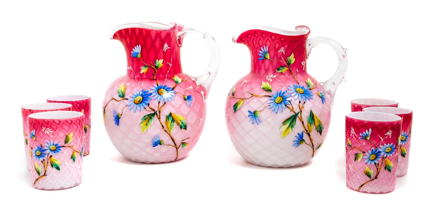 A Victorian Enameled Mother-of-Pearl Satin Glass Drink Set Height of pitcher 8 1/2 inches — 19TH CENTURY