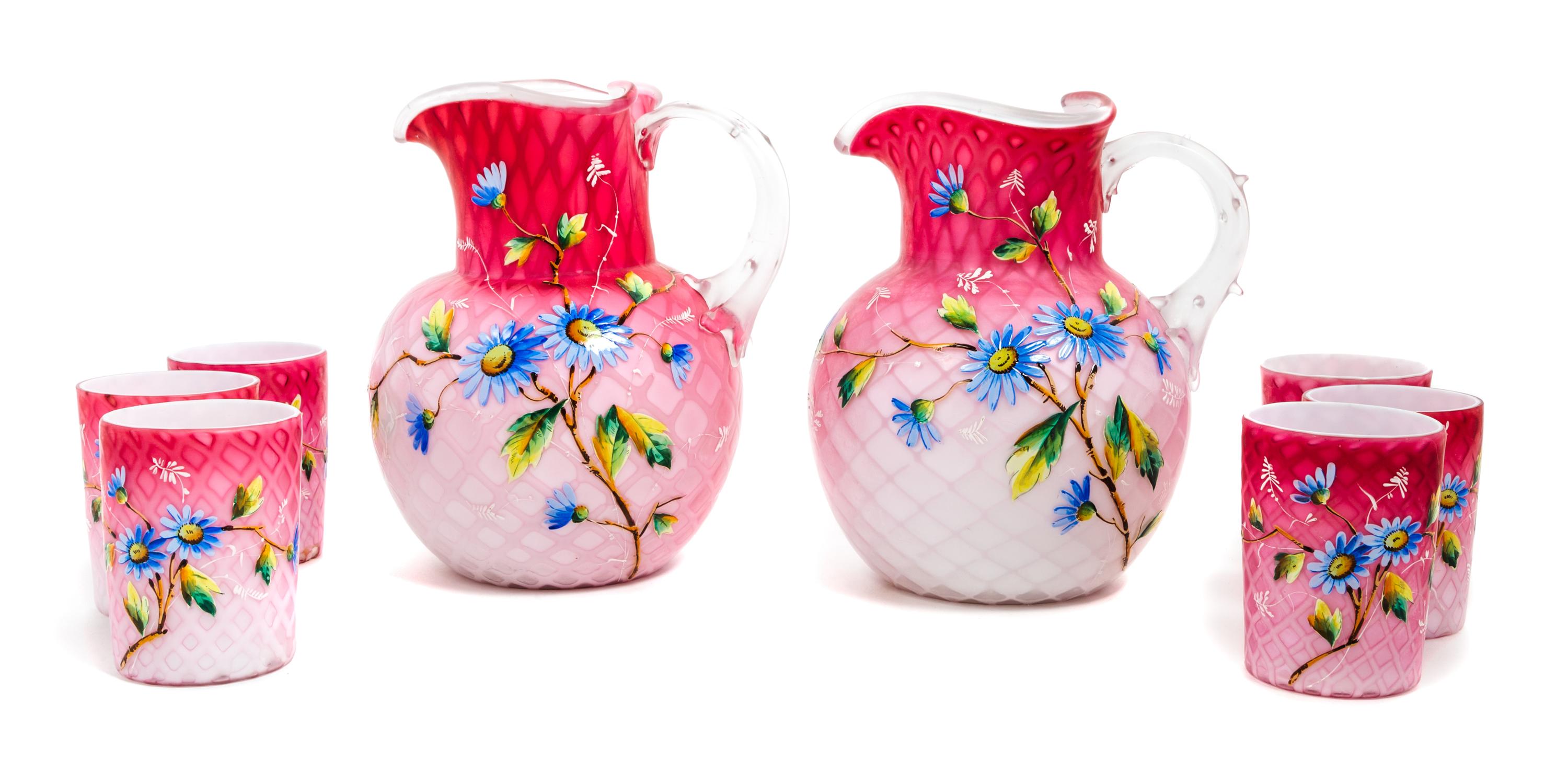 A Victorian Enameled Mother-of-Pearl Satin Glass Drink Set Height of pitcher 8 1/2 inches — 19TH CENTURY