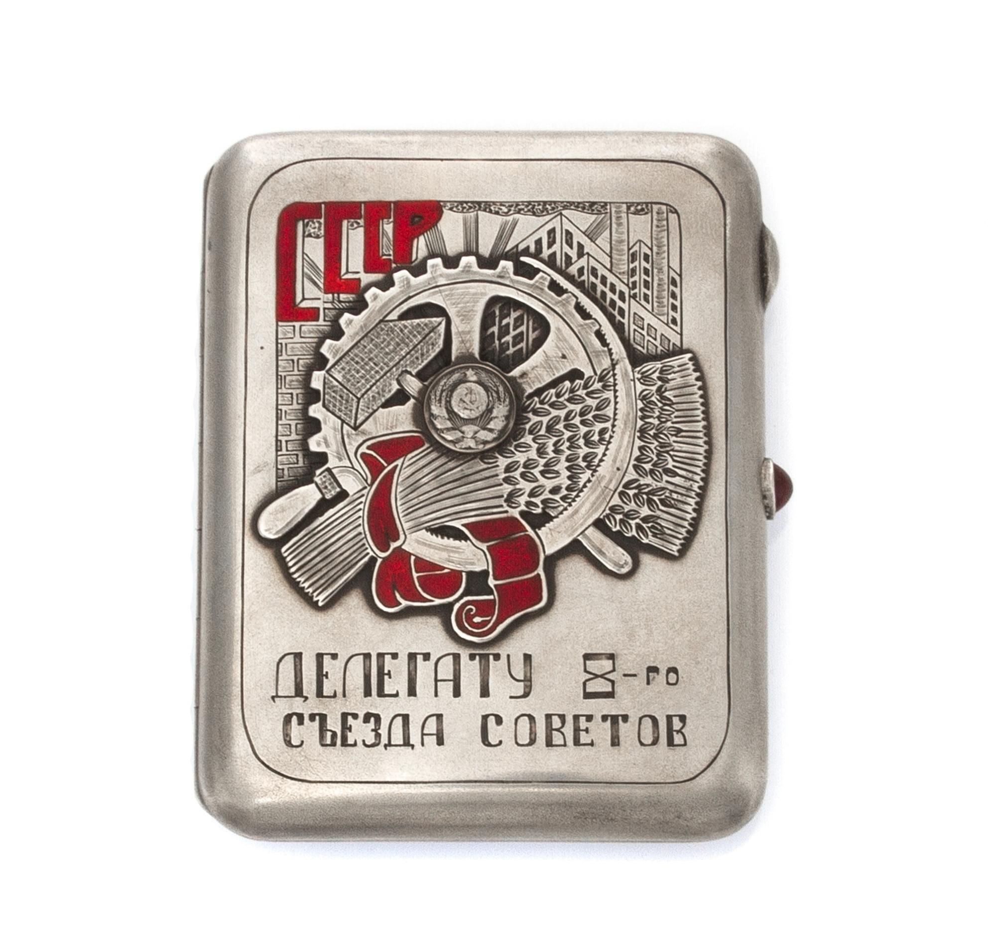 A Soviet Russian Silver and Enamel Cigarette Case, Marked with a Soviet-era Artel stamp, Moscow, the lid centered by the seal of the So