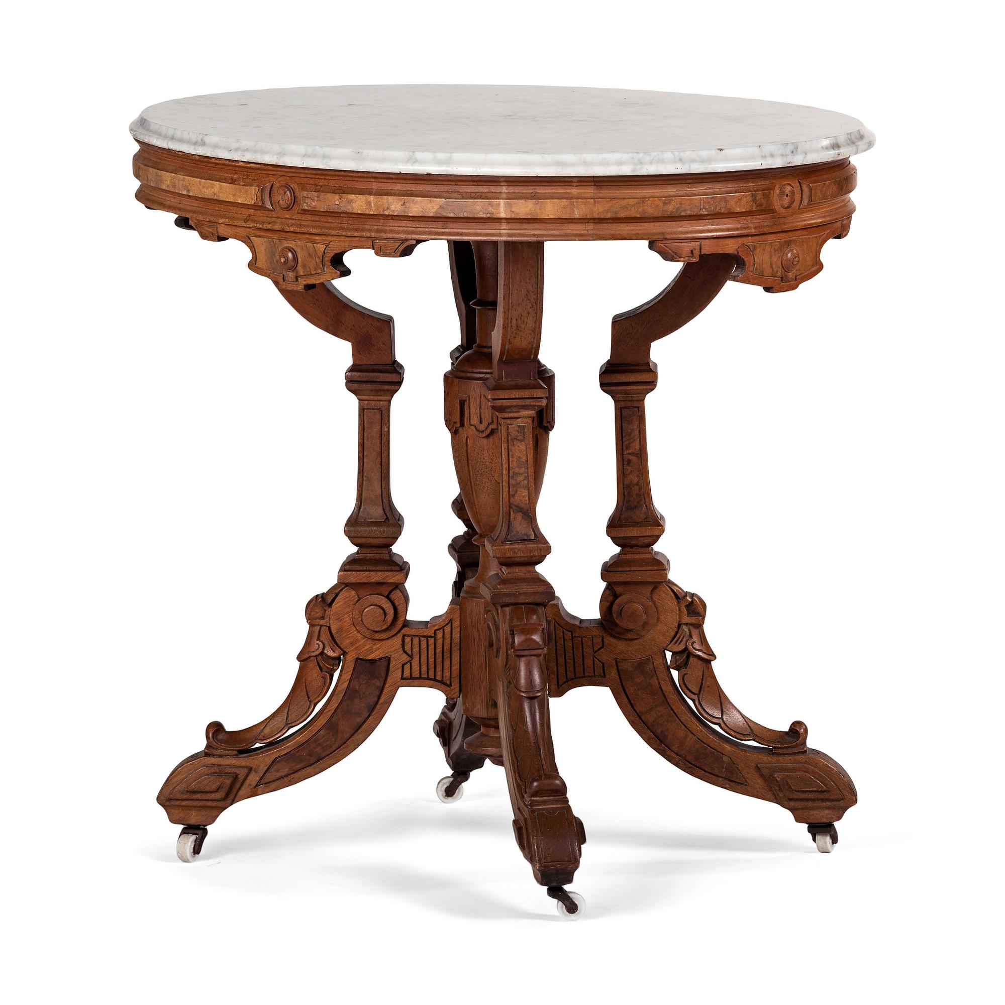 A Victorian Walnut Table with Marble Top