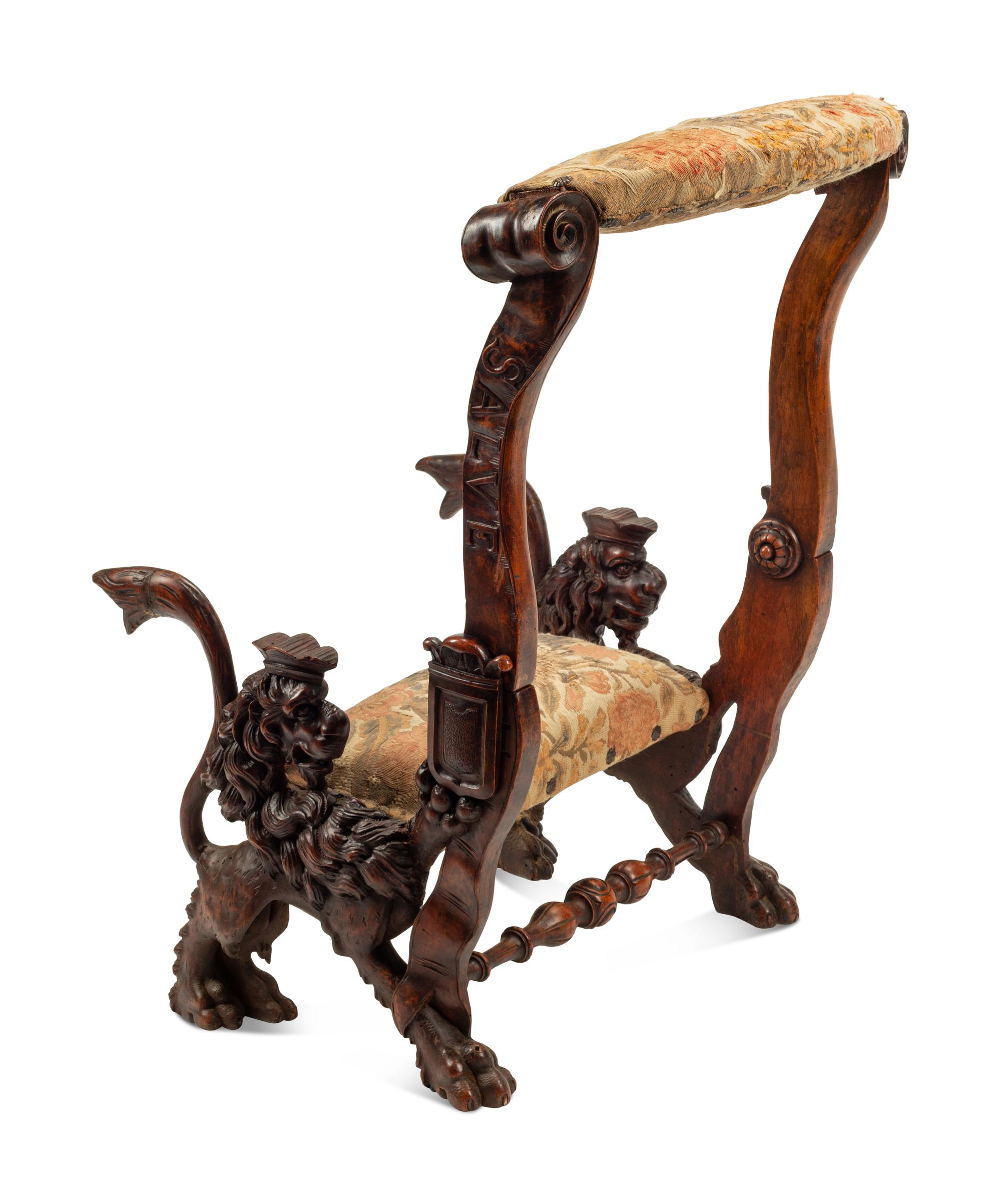 An Italian Carved Walnut Low Armchair