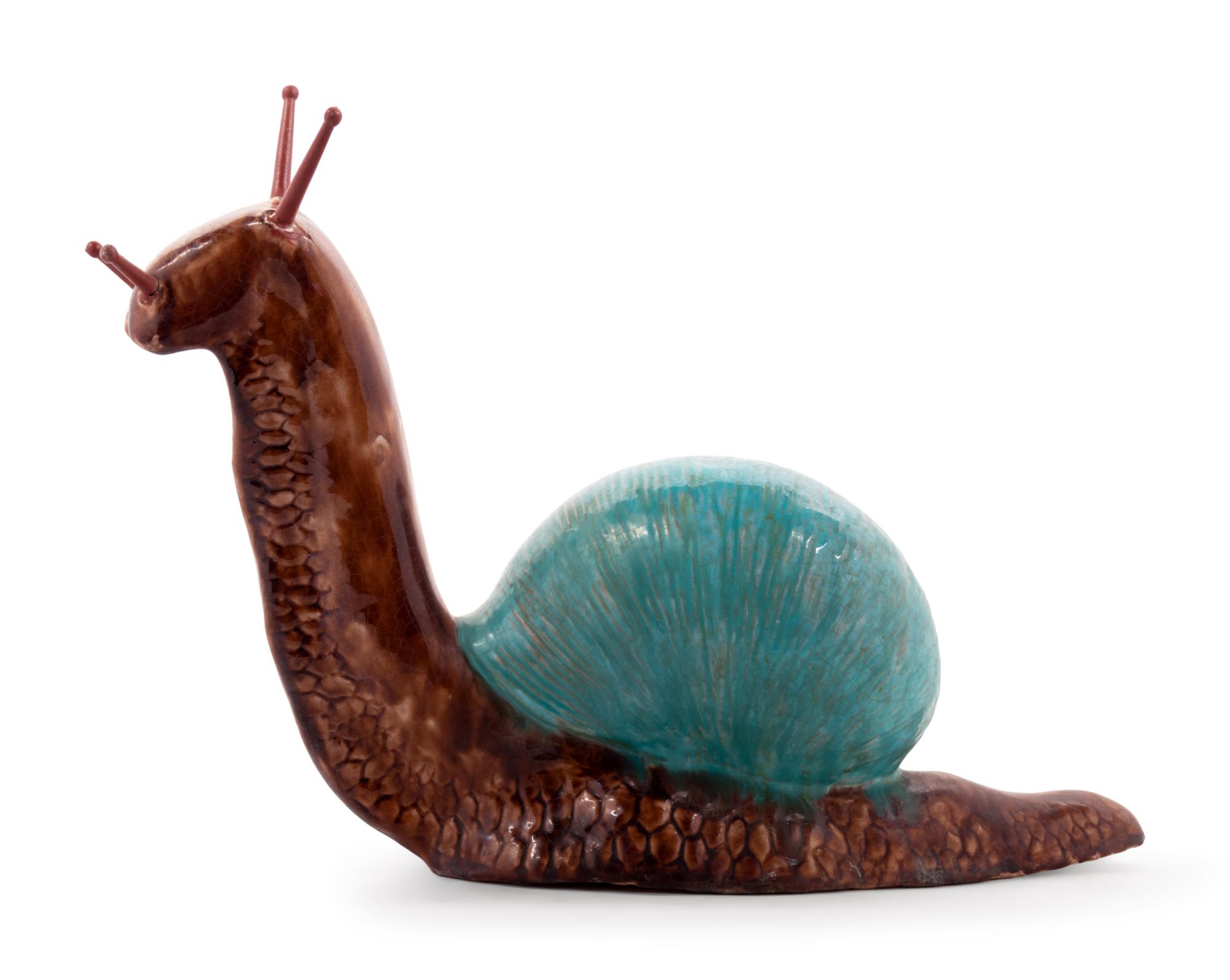 A Large Glazed Pottery Figure of a Snail