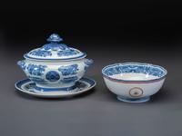 A Chinese Export Blue Fitzhugh Porcelain Tureen, Undertray, and Punch Bowl