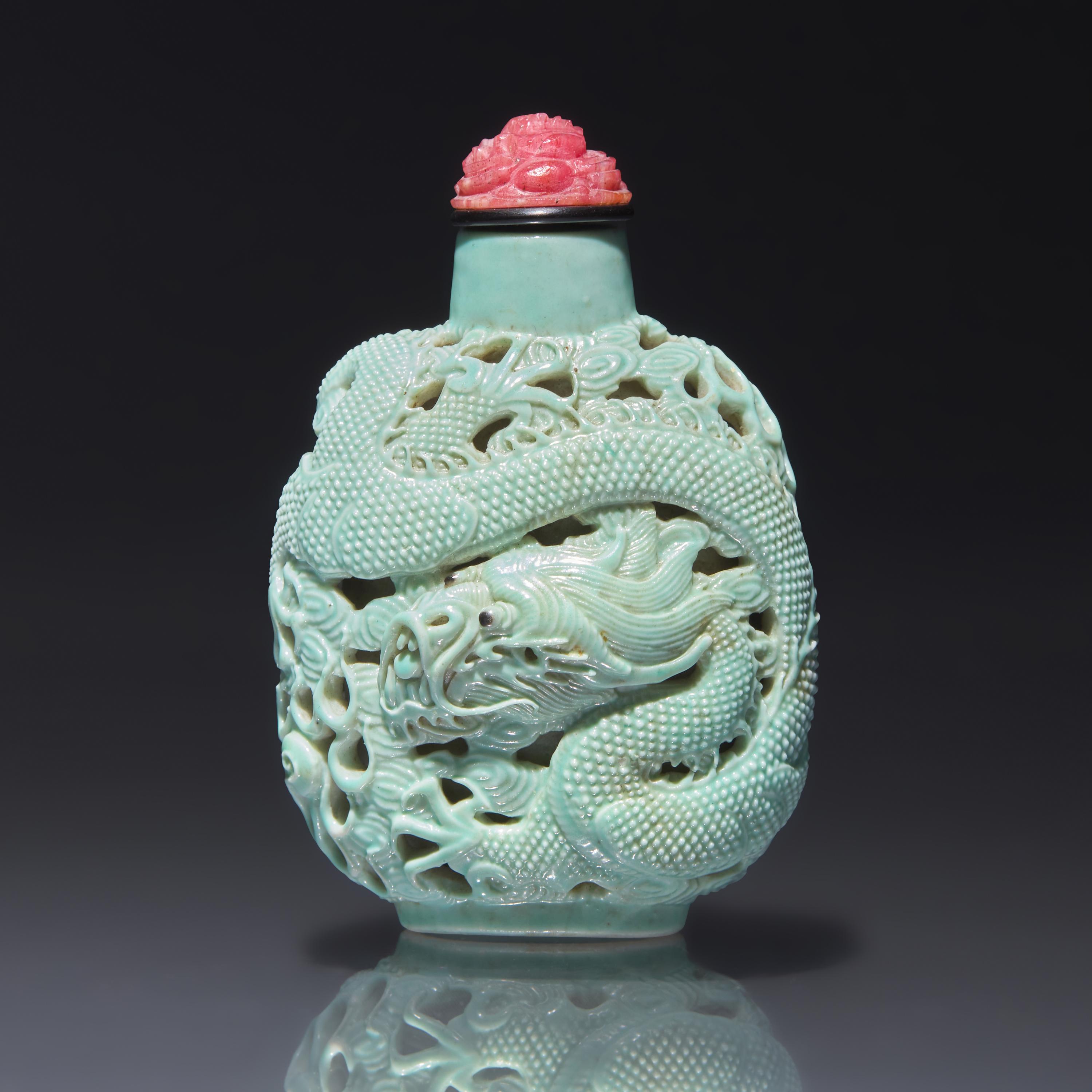A Chinese Turquoise-Glazed Reticulated Porcelain "Dragon" Snuff Bottle, Qing Dynasty, Second Half 19th Century