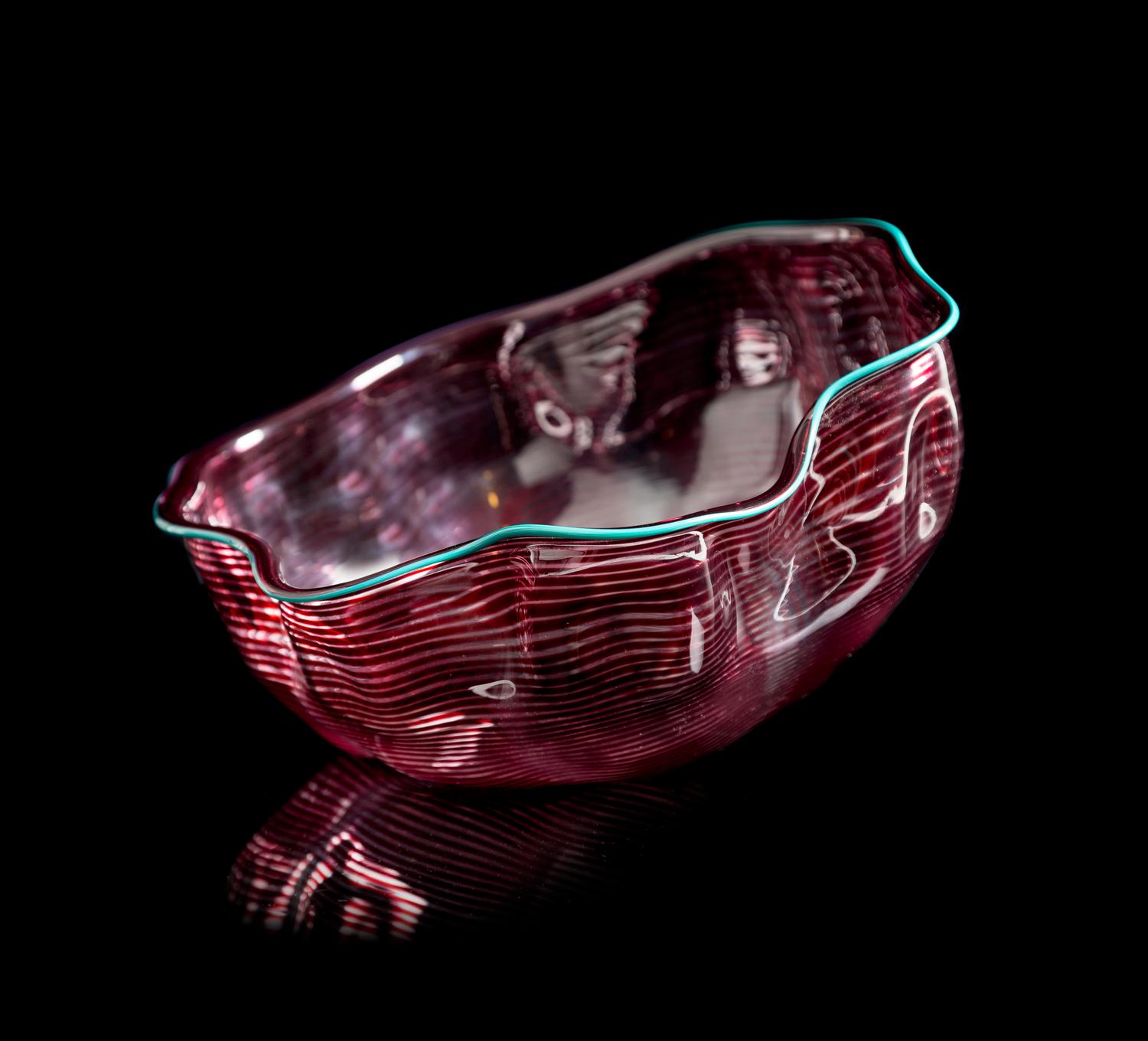 Dale Chihuly, (American, b. 1941), Sea Form Basket in Purple with Turquoise Lip, 1986