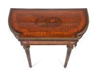 A Louis XVI Style Bronze-Mounted Marquetry Games Table