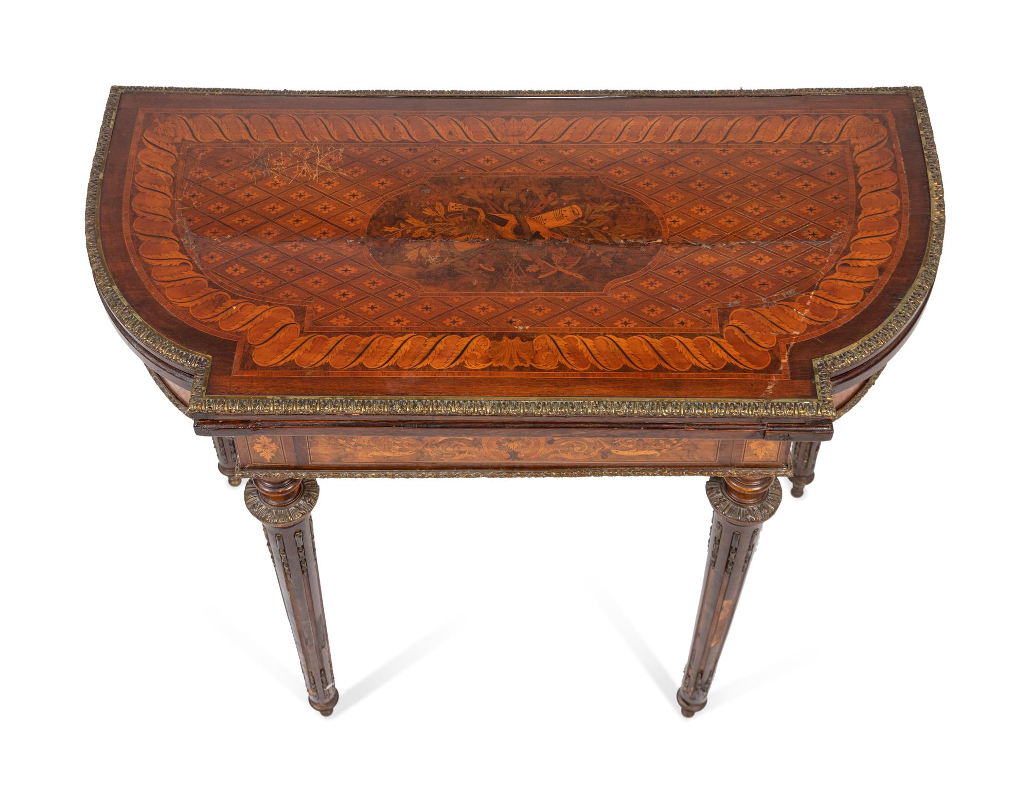A Louis XVI Style Bronze-Mounted Marquetry Games Table