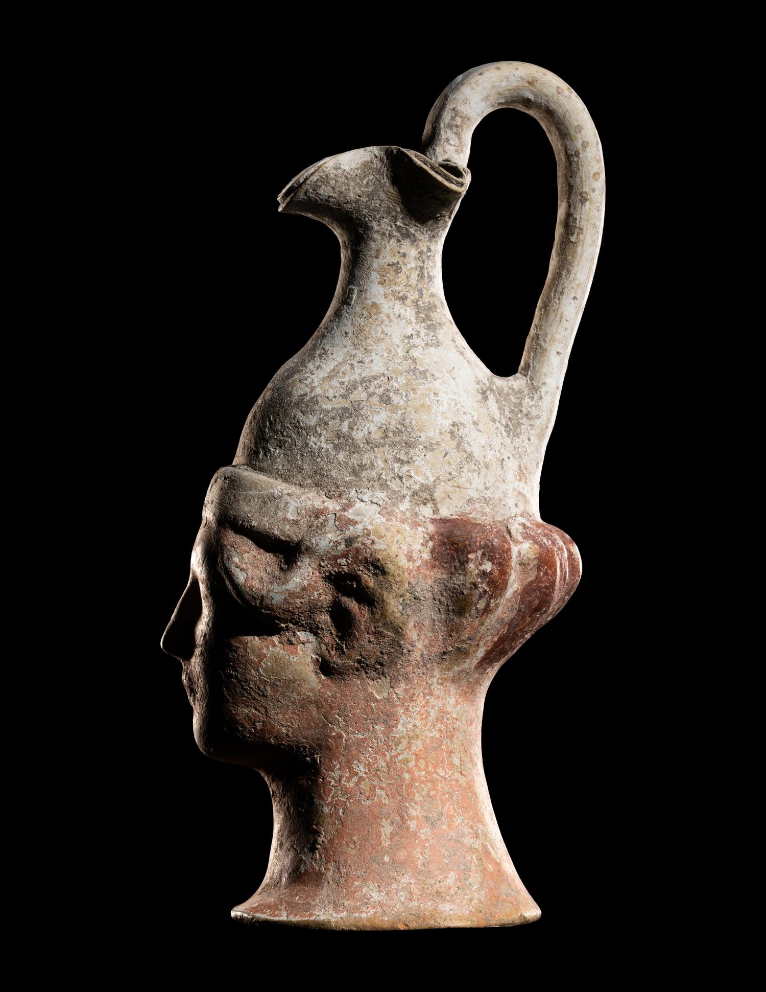 A Canosan Trefoil Oinochoe in the Form of a Head of a Man