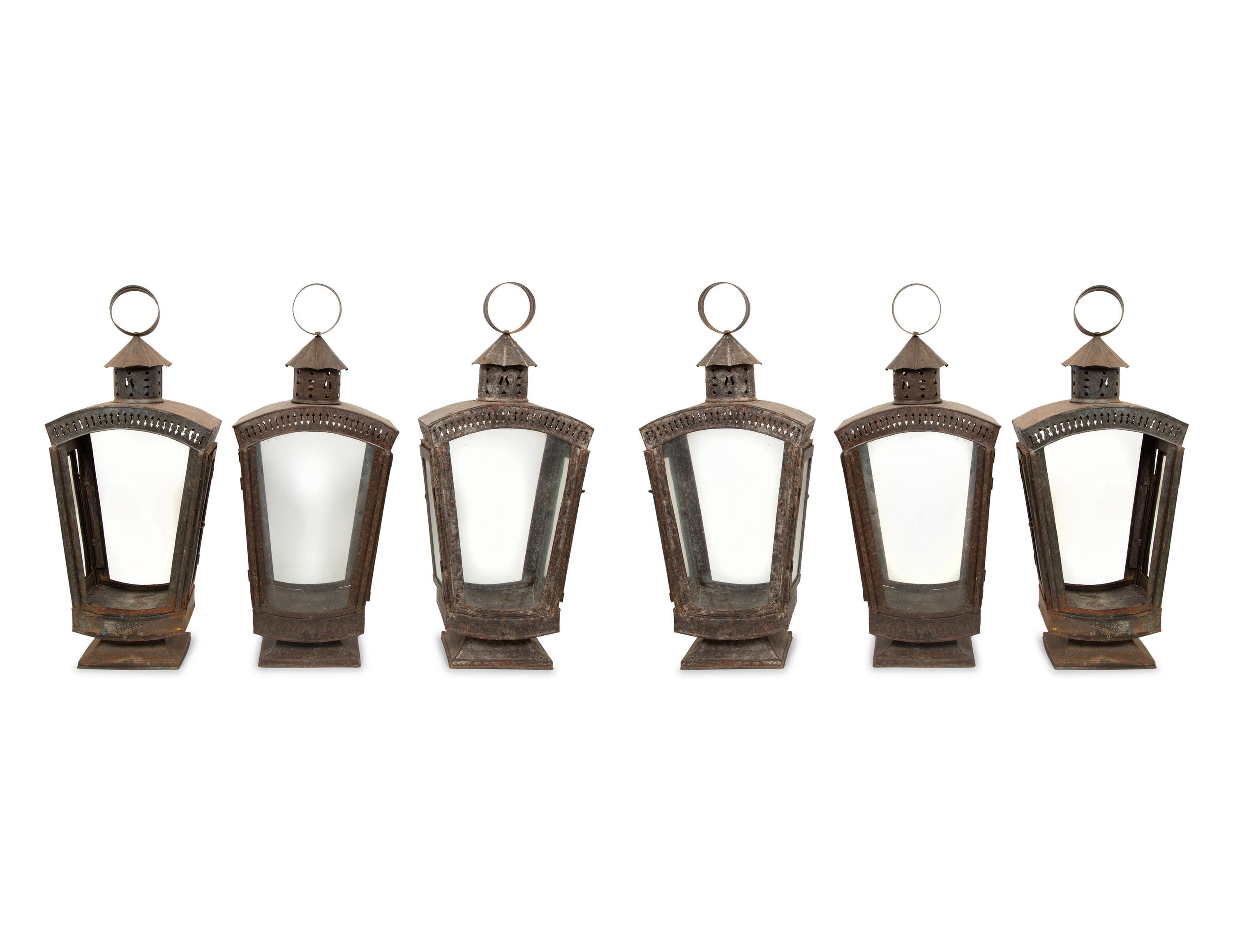 A Group of Six Patinated Metal Lanterns