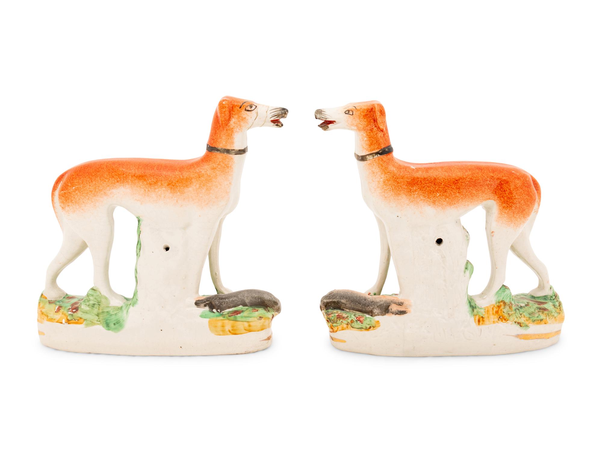 Two Pairs of Staffordshire Whippets and Spaniels