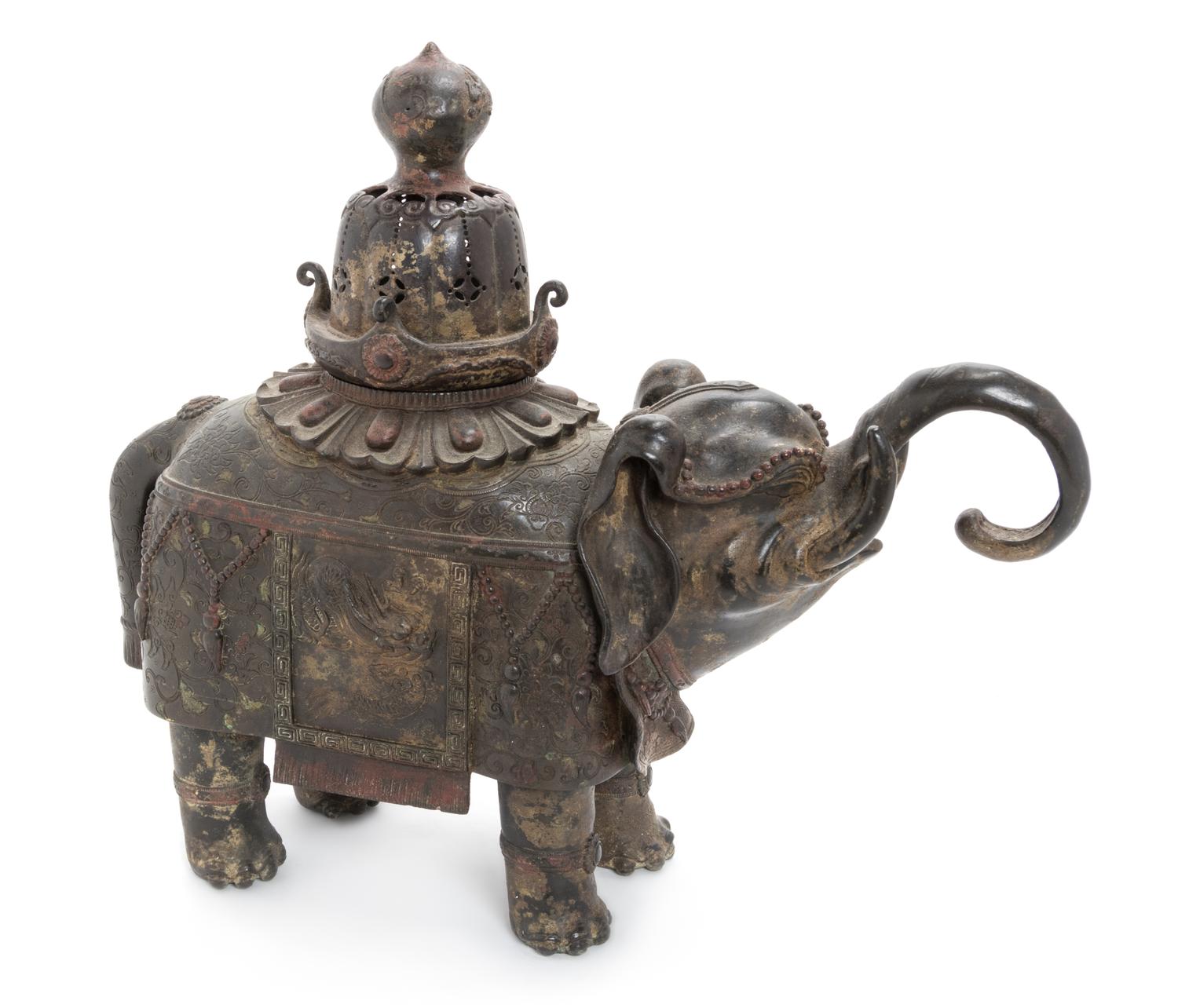 A Chinese Bronze Elephant-Form Censer Height 14 3/4 inches. — MING DYNASTY (1368-1644)