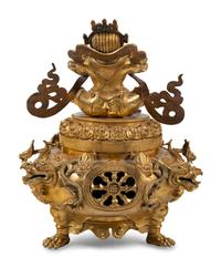 A Sino-Tibetan Style Gilt Bronze Tripod Incense Burner
