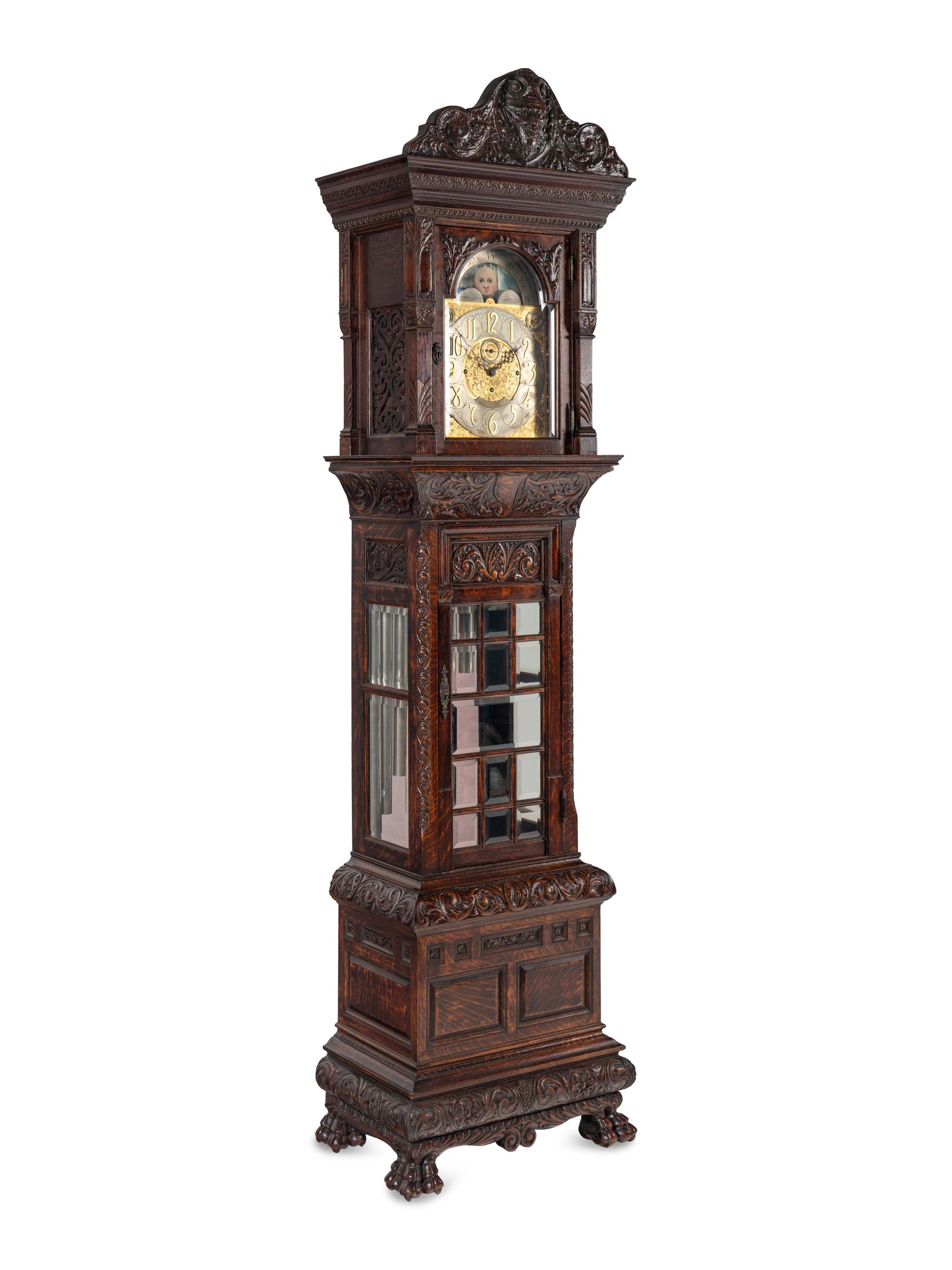 A Renaissance Revival Carved Oak Eight-Tube Tall Case Clock