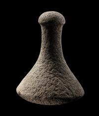 A Tahitian Basalt Poi Pounder