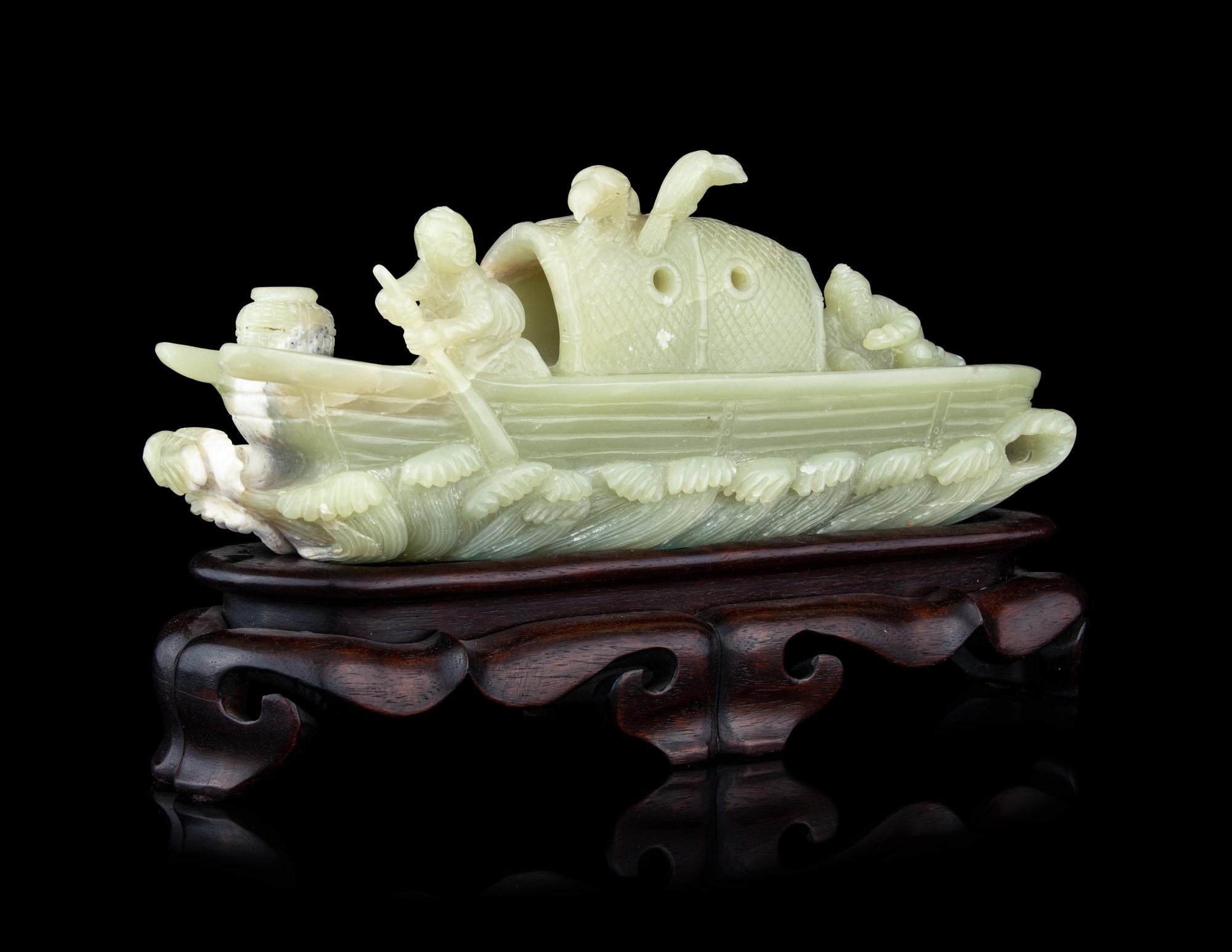 A Chinese Celadon Jade Boat