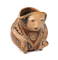 A Casas Grande Polychrome Human Effigy Vessel Height 8 x diameter 5 1/2 inches.