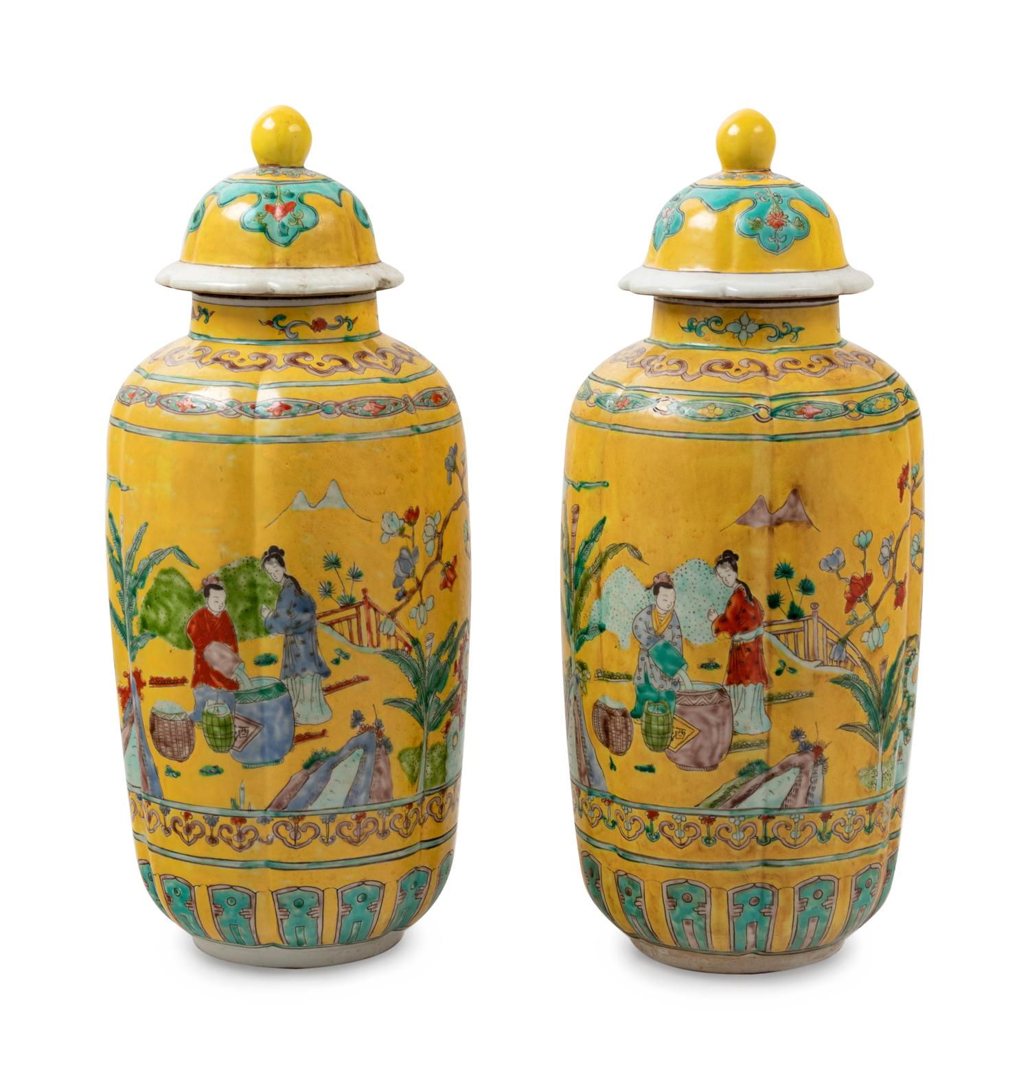 A Pair of Chinese Famille Jaune Porcelain Covered Jars