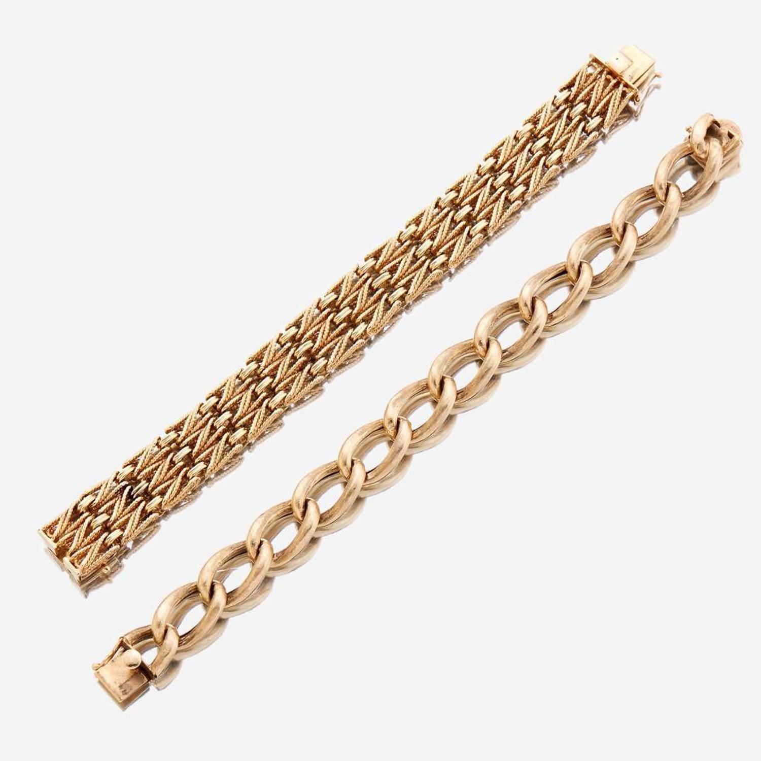 Two fourteen karat gold bracelets