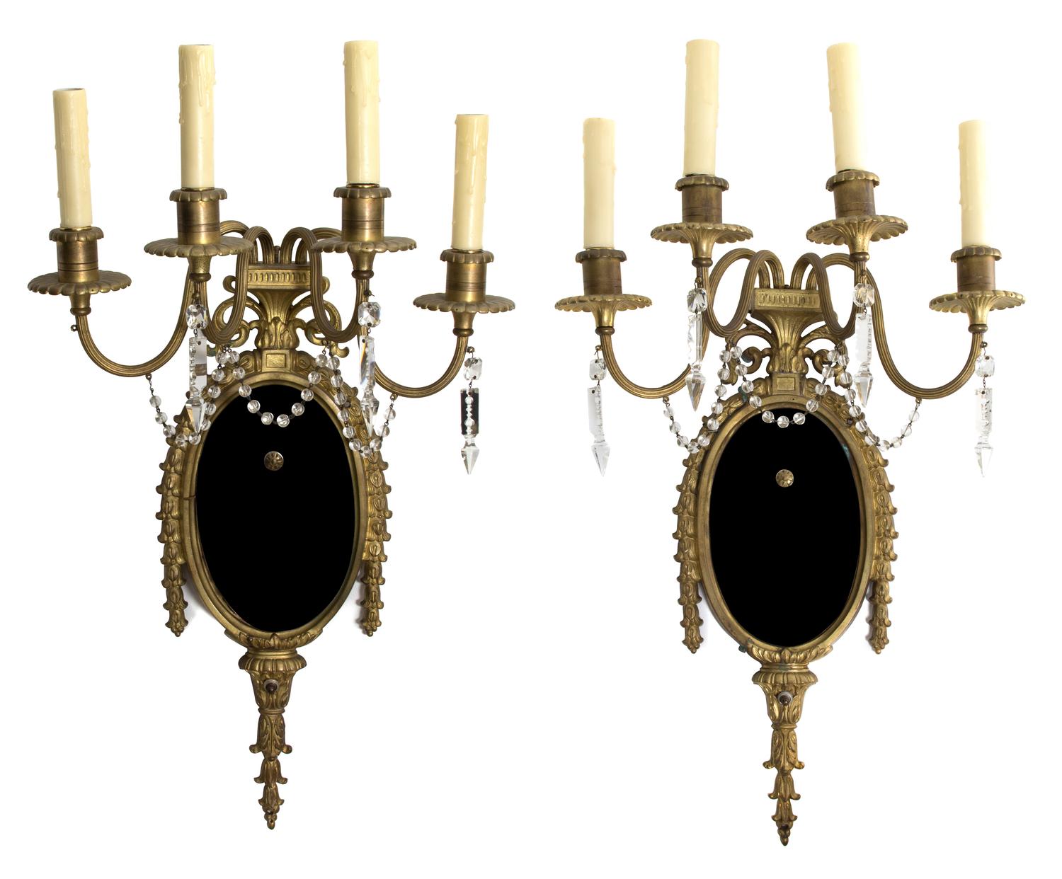 A Pair of Louis XVI Style Gilt Bronze and Beaded Crystal Four-Light Wall Sconces Height 27 1/2 inches. — 19TH CENTURY
