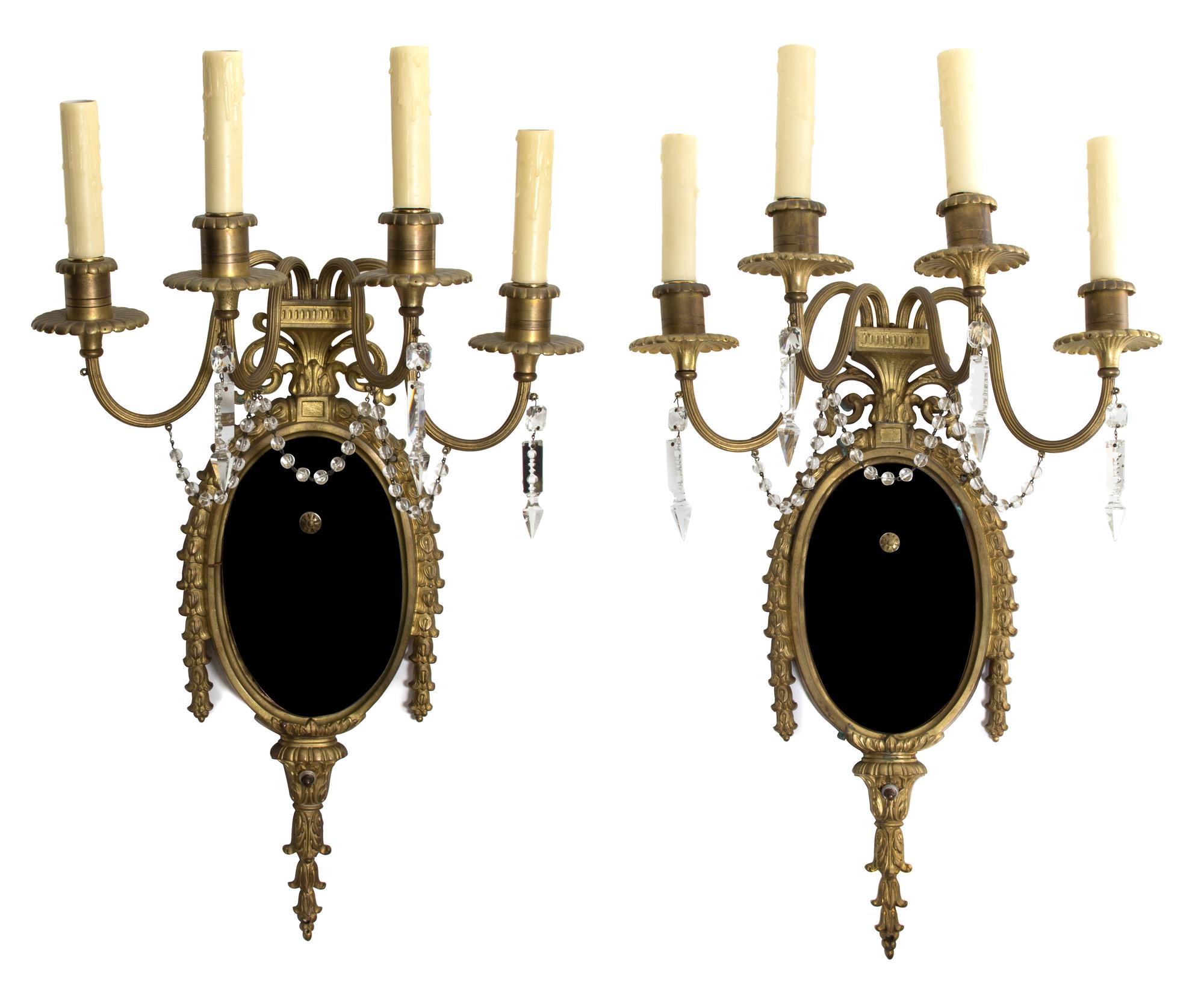 A Pair of Louis XVI Style Gilt Bronze and Beaded Crystal Four-Light Wall Sconces Height 27 1/2 inches. — 19TH CENTURY
