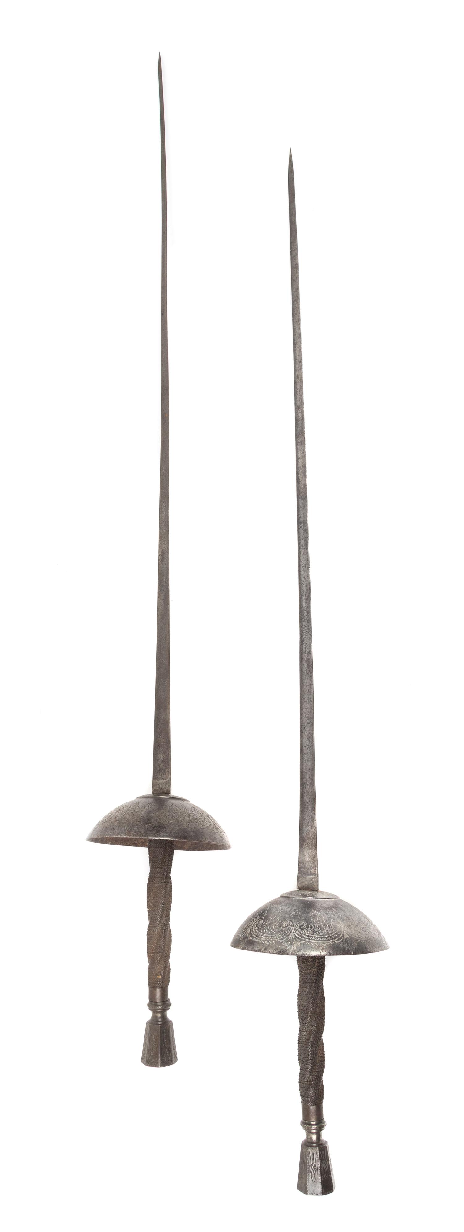 A Matched Pair of Continental Fencing Epees Length 38 1/4 inches.