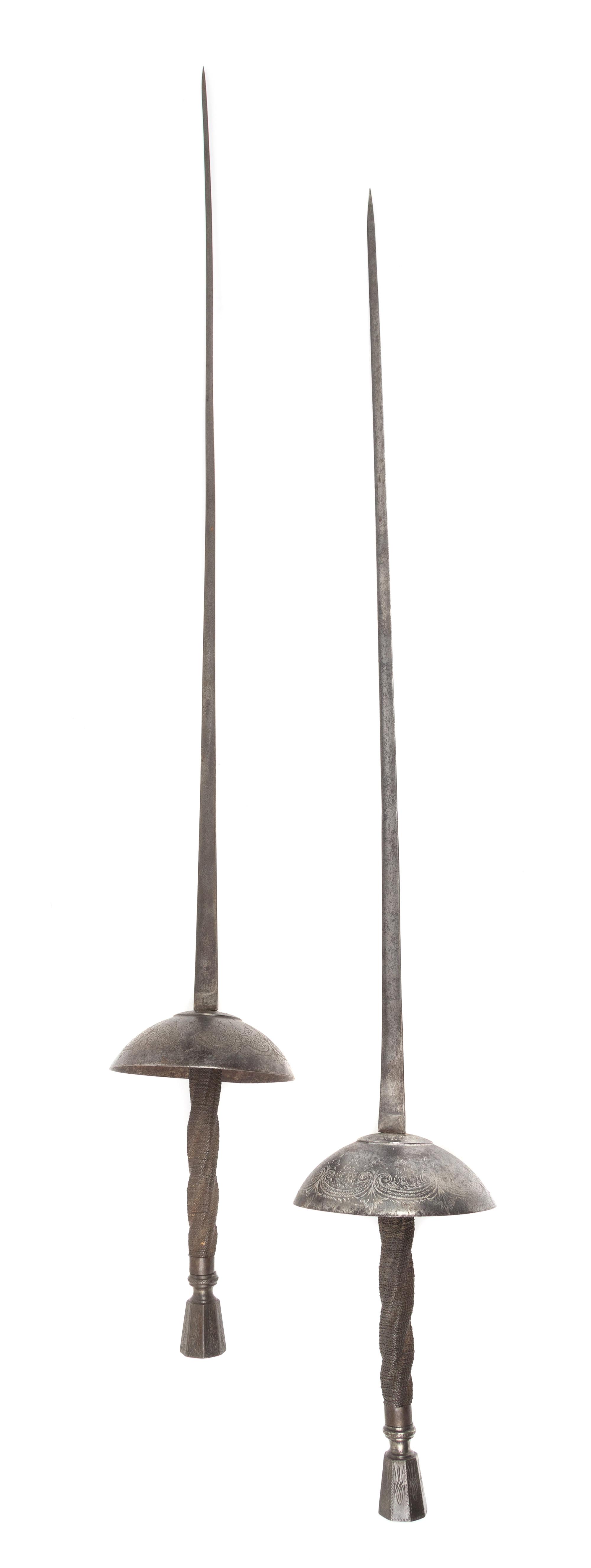 A Matched Pair of Continental Fencing Epees Length 38 1/4 inches.