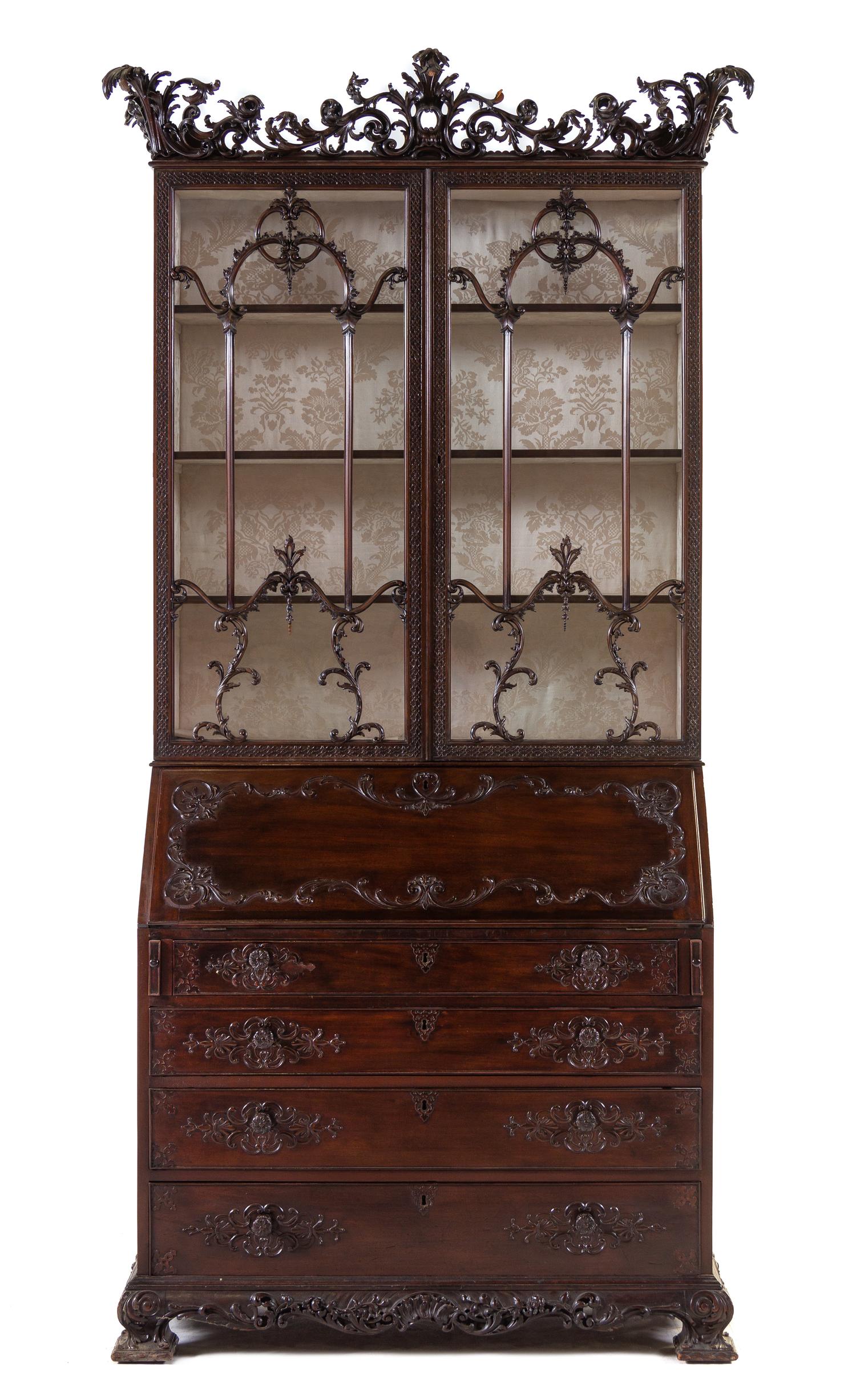 A George III Carved Mahogany Slant-Front Secretary Bookcase