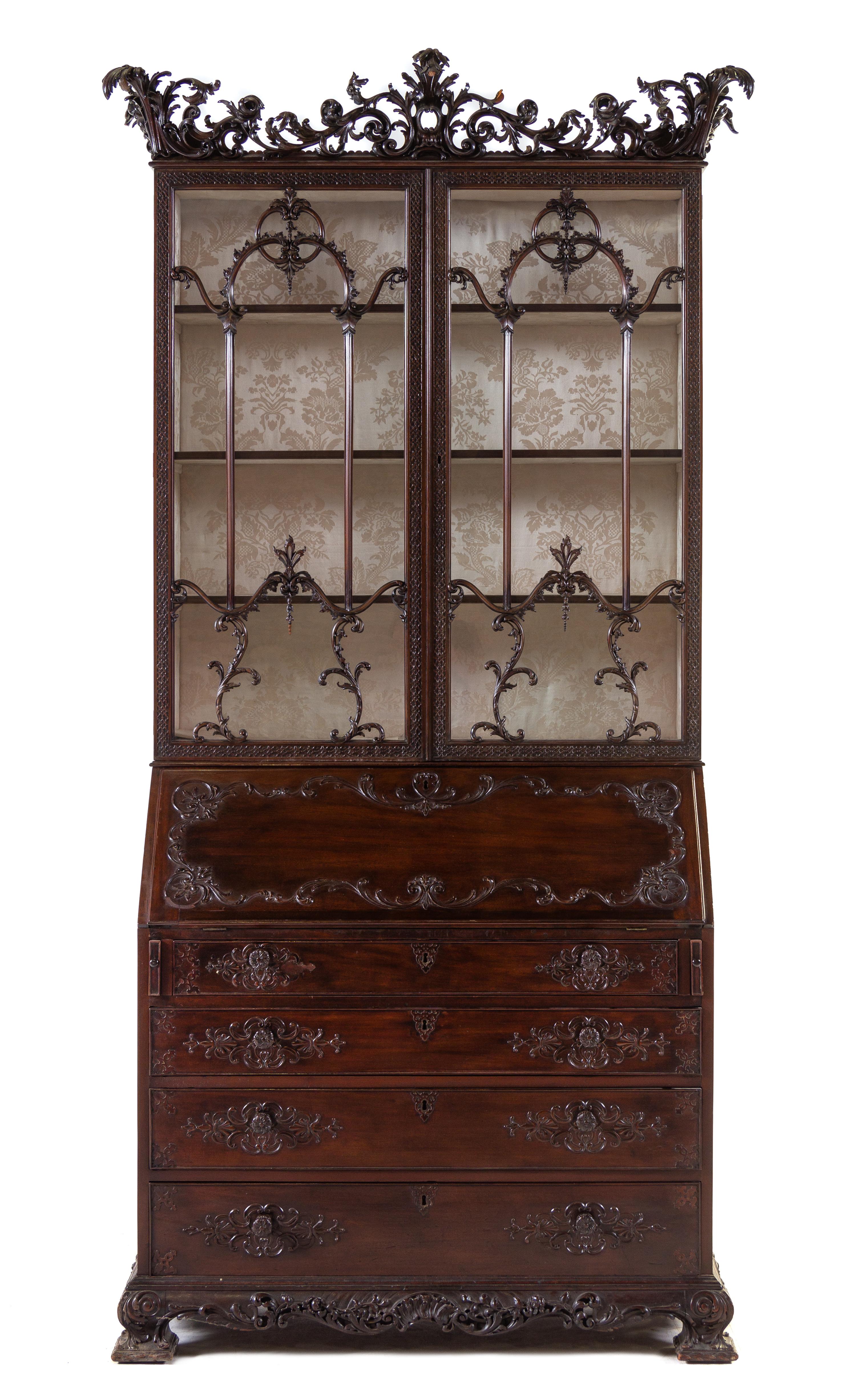 A George III Carved Mahogany Slant-Front Secretary Bookcase