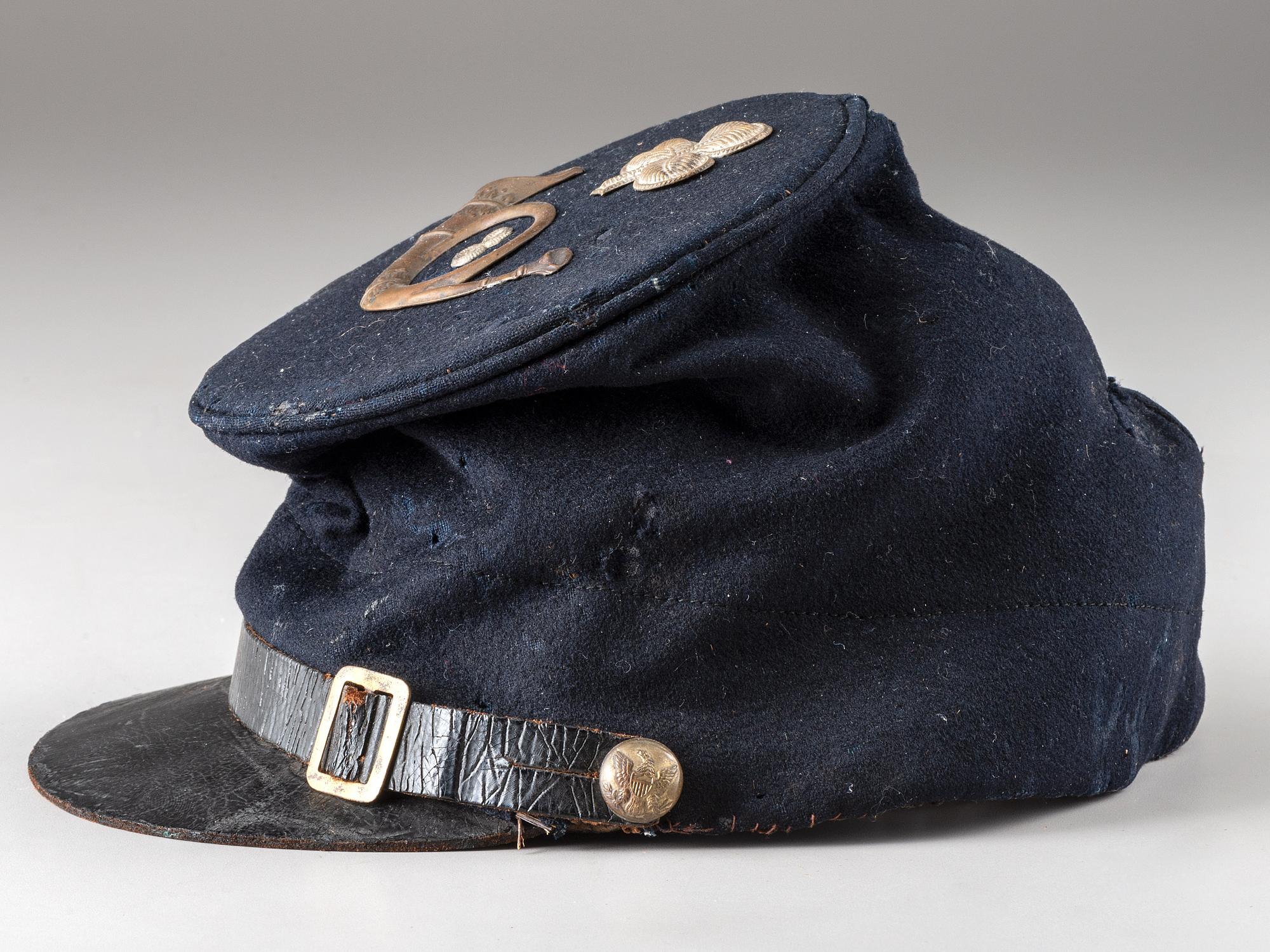 [CIVIL WAR]. 8th Ohio Infantry 1858 pattern forage cap with insignia and II corps badge.