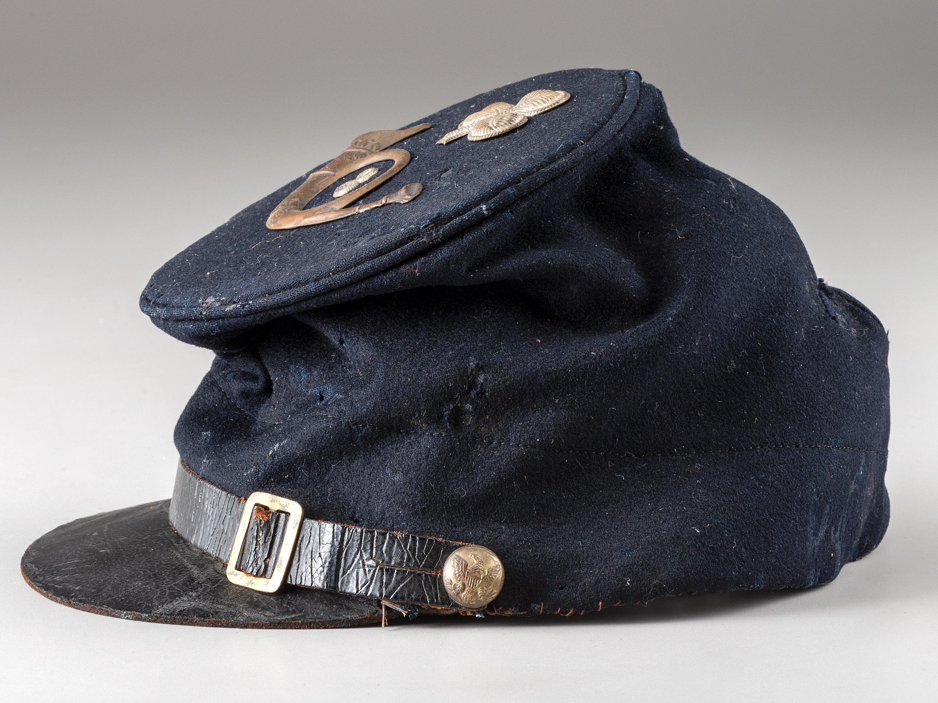 [CIVIL WAR]. 8th Ohio Infantry 1858 pattern forage cap with insignia and II corps badge.